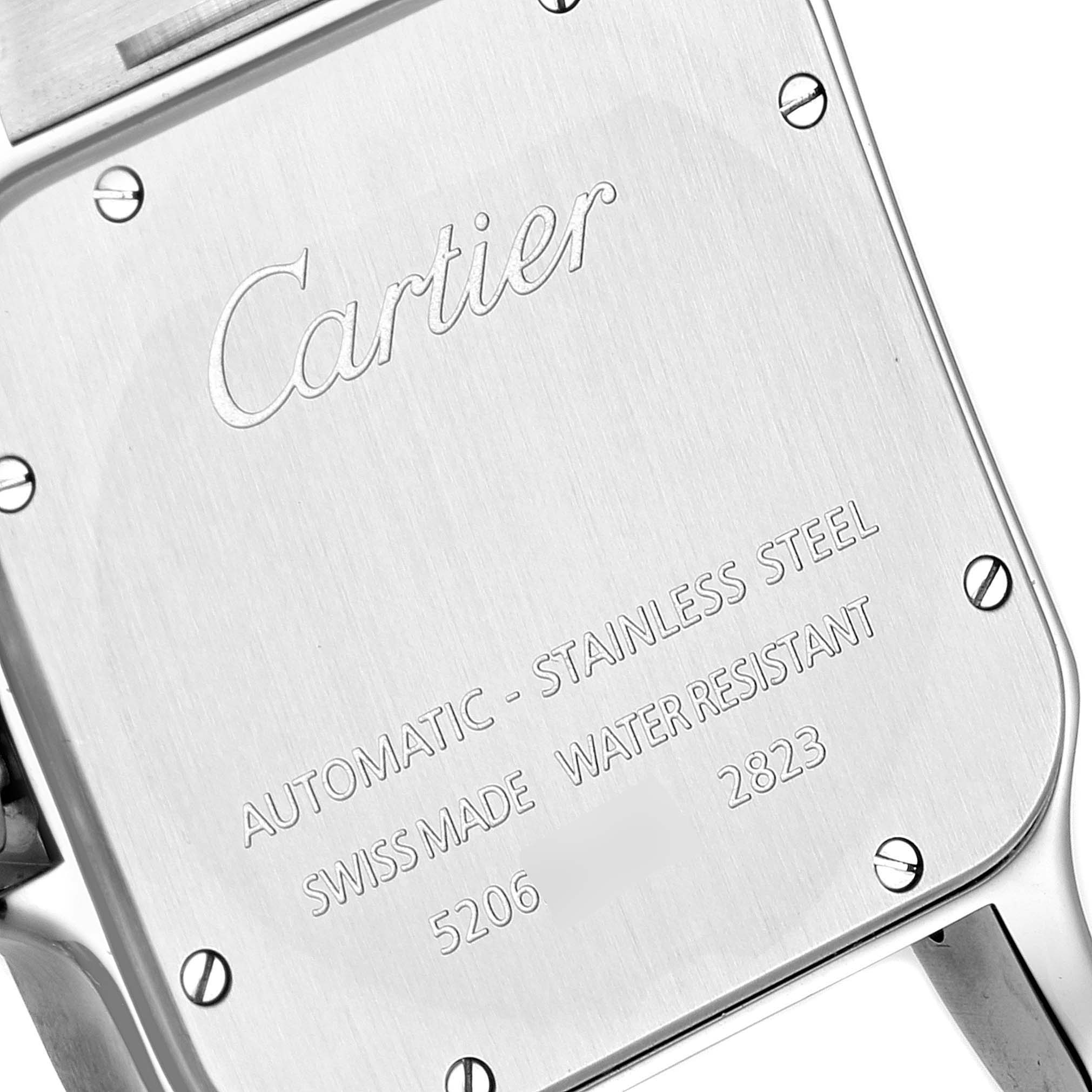 This image shows the back case of a Cartier Santos W20098D6 Men's Stainless Steel Silver Dial W20098D6 Men's Stainless Steel Silver Dial model watch, highlighting the engravings and screws.