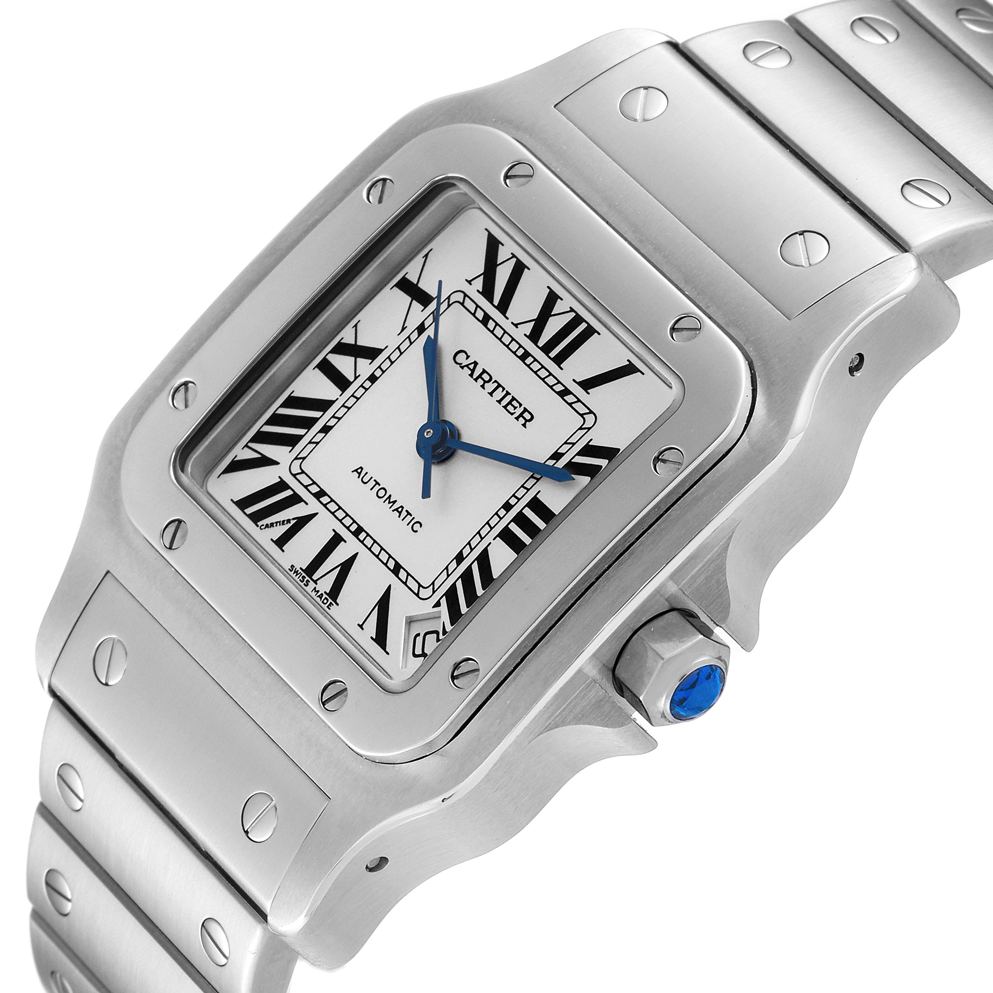 The image shows a close-up angle of the Cartier Santos W20098D6 Men's Stainless Steel Silver Dial W20098D6 Men's Stainless Steel Silver Dial watch, displaying its face, bezel, crown, and part of the bracelet.