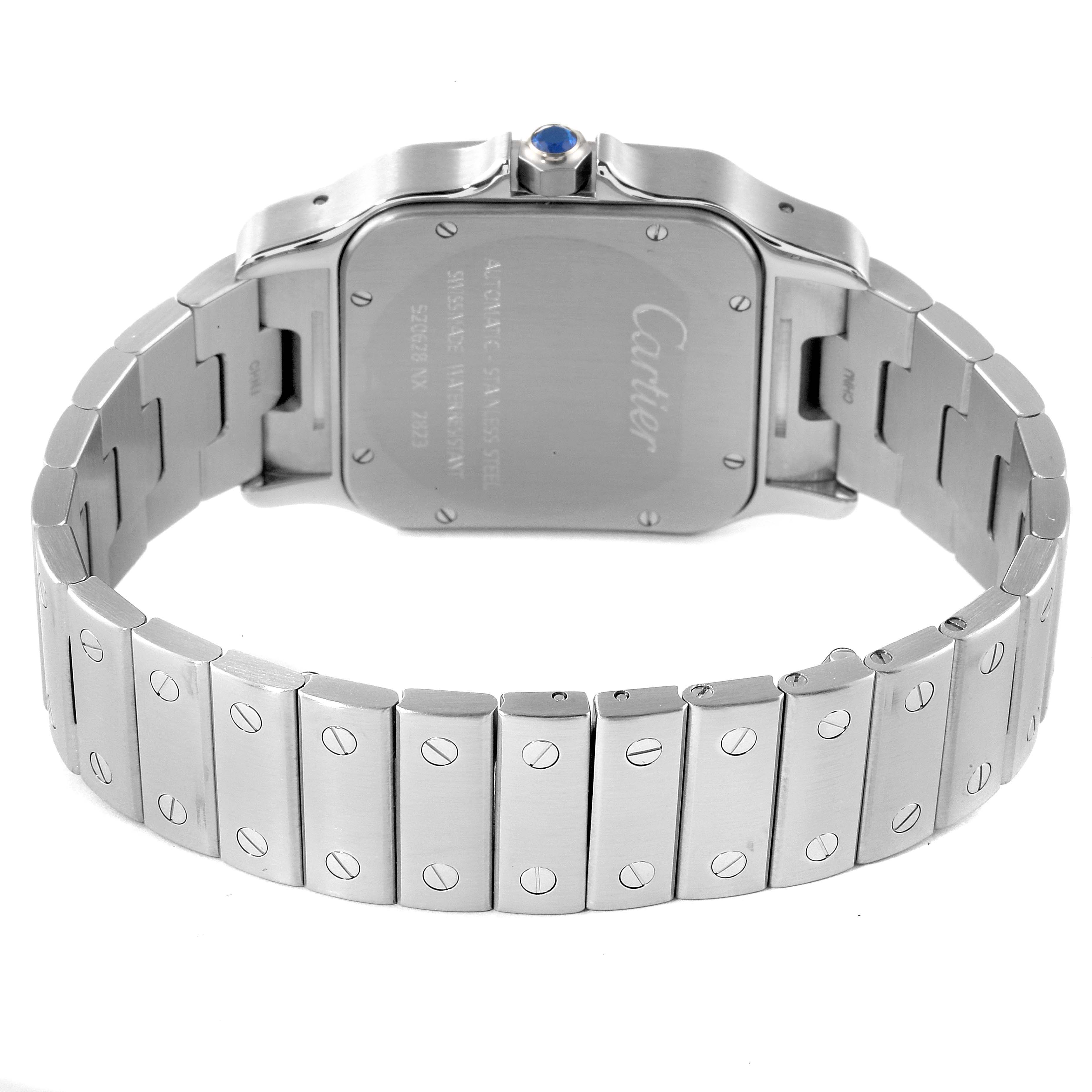 This image shows the back view of a Cartier Santos W20098D6 Men's Stainless Steel Silver Dial W20098D6 Men's Stainless Steel Silver Dial watch, highlighting its case and metallic bracelet.