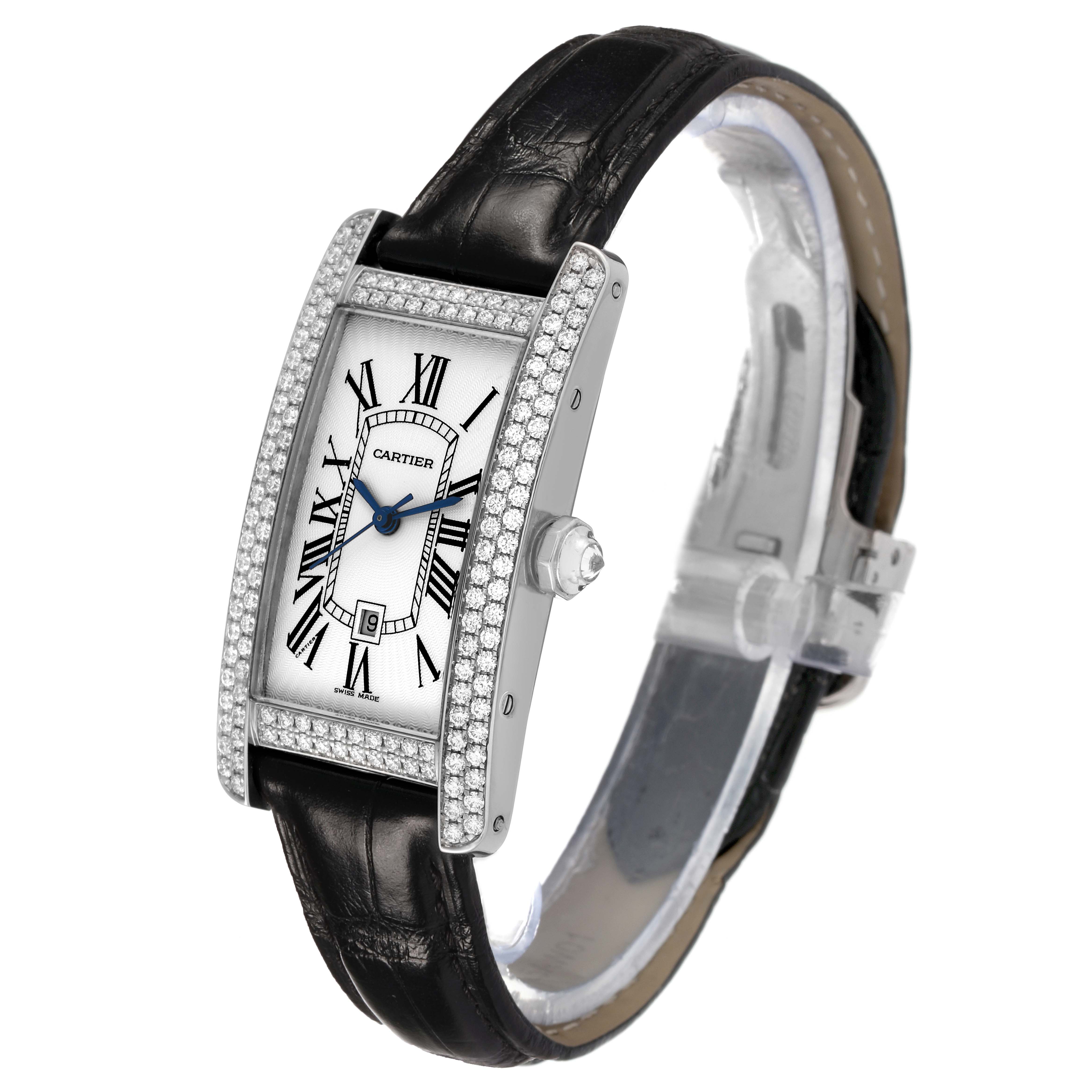 The Cartier Tank Americaine WB710002 Women's White Gold Silver Dial watch is shown at a tilted angle, highlighting its rectangular face, diamond bezel, and leather strap.