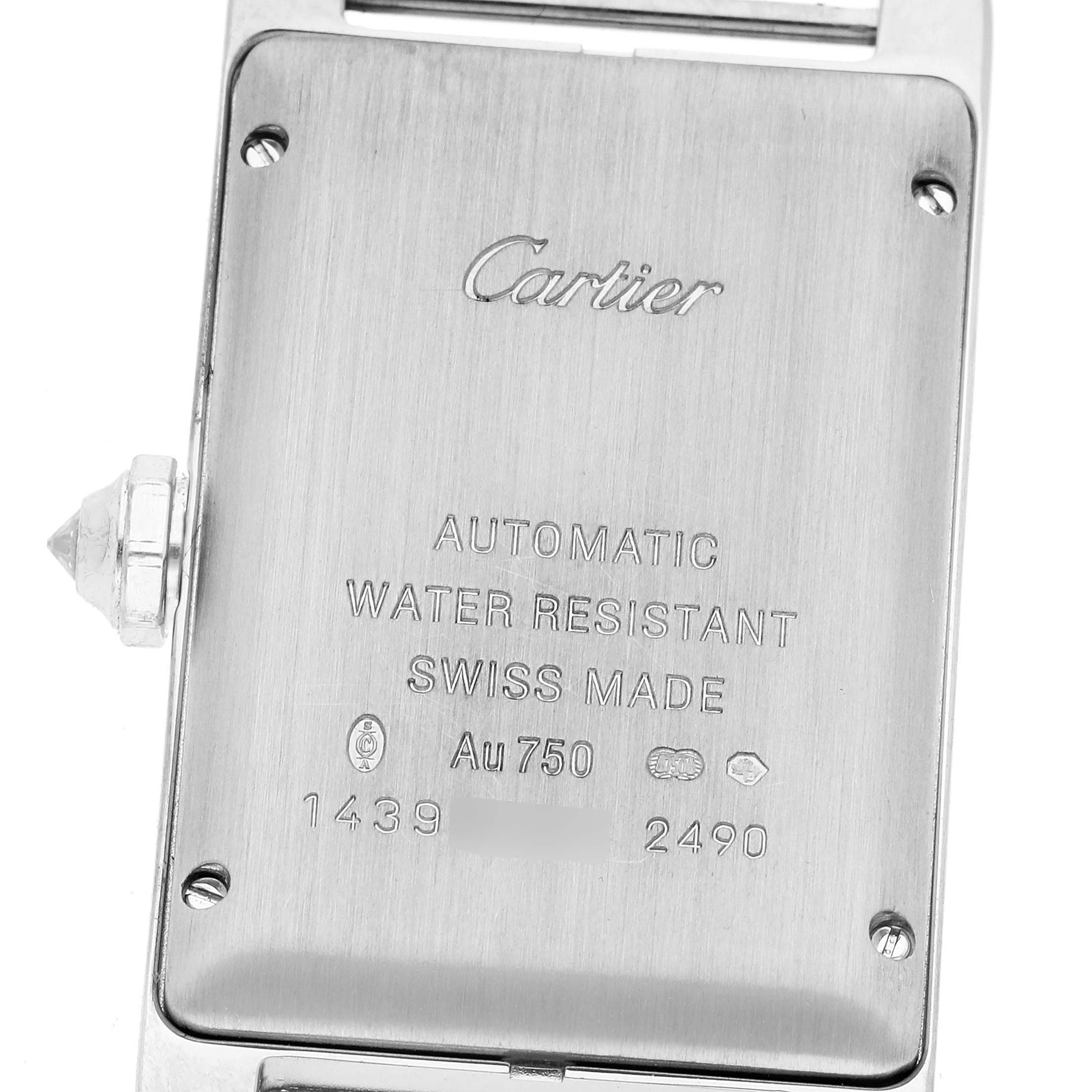 The image shows the back case of the Tank Americaine watch by Cartier from a close-up rear angle.