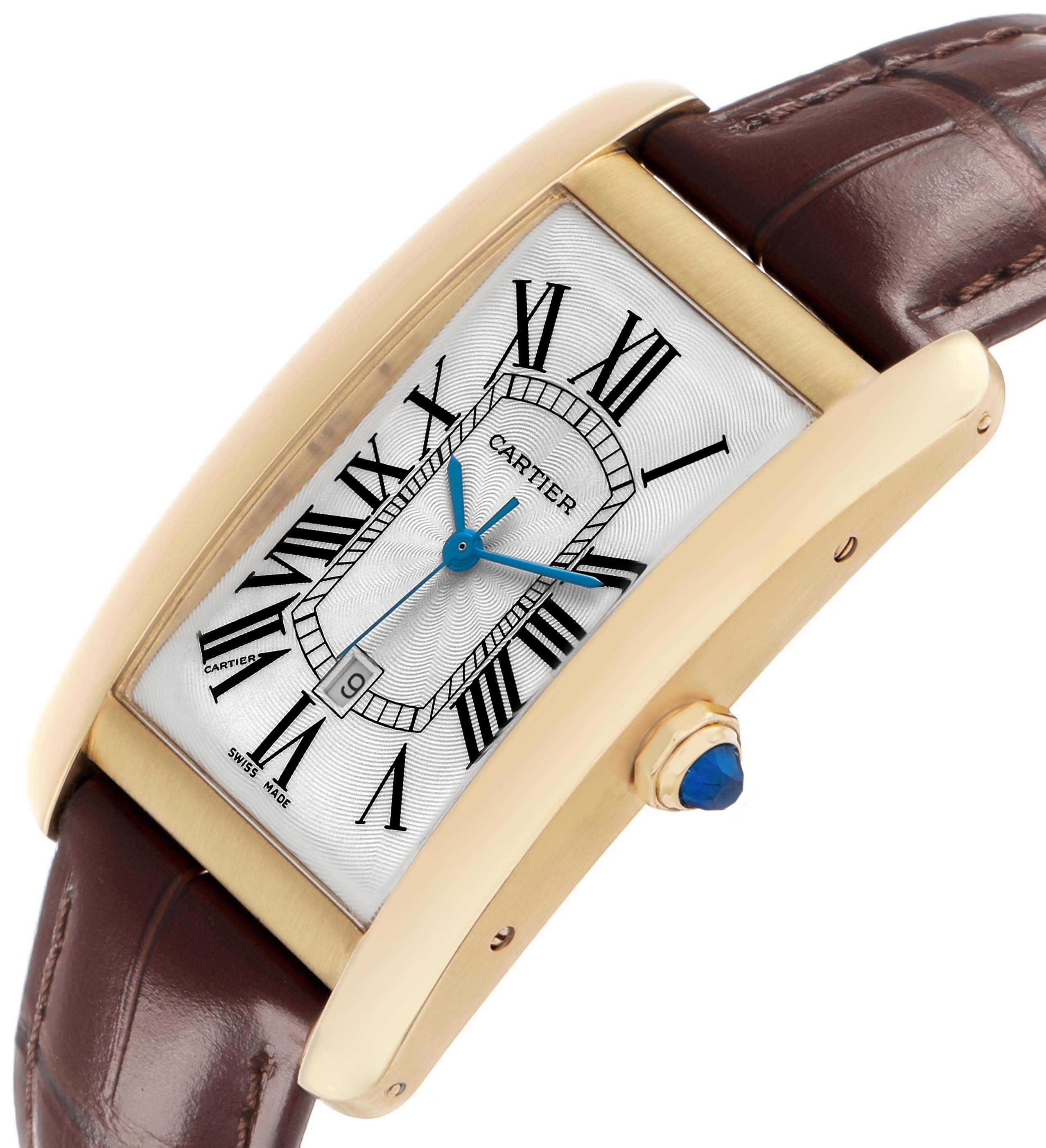 The Cartier Tank Américaine watch is shown from a side angle, highlighting its elongated gold case, curved design, and leather strap.