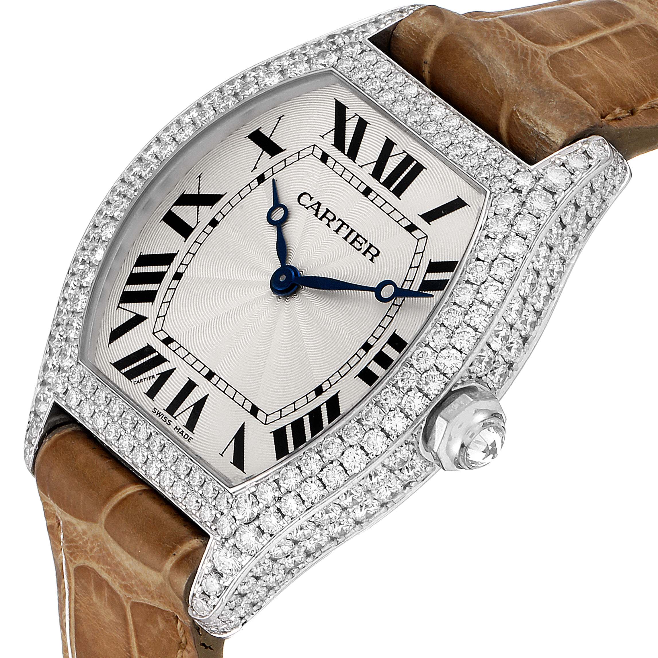 The Cartier Tortue WA504351 Men's White Gold Silver Dial WA504351 Men's White Gold Silver Dial watch is shown from a slightly angled top view, featuring its dial, bezel, crown, and part of the strap.