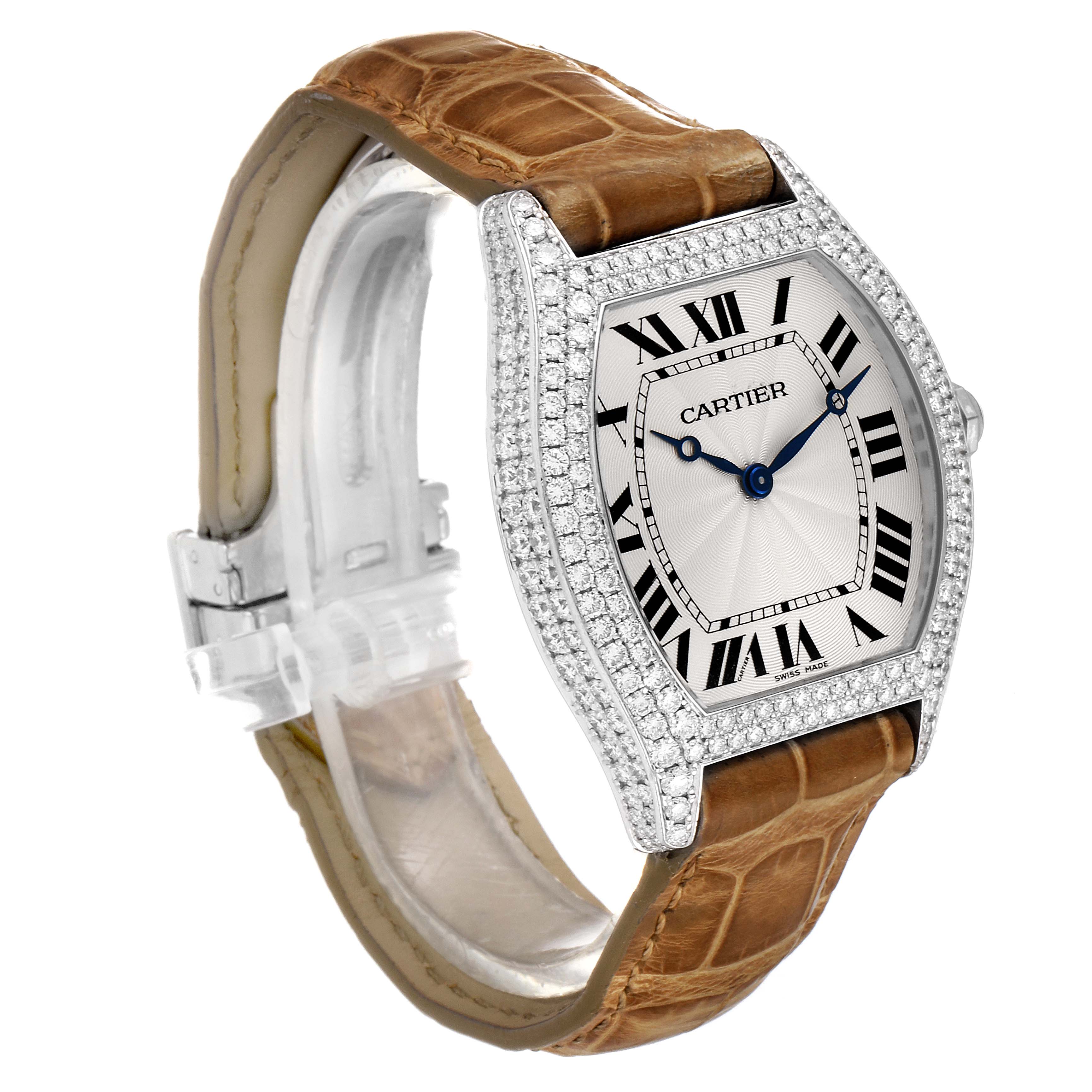 The Cartier Tortue WA504351 Men's White Gold Silver Dial WA504351 Men's White Gold Silver Dial watch is shown from a three-quarter angle, featuring its face, case, and leather strap.