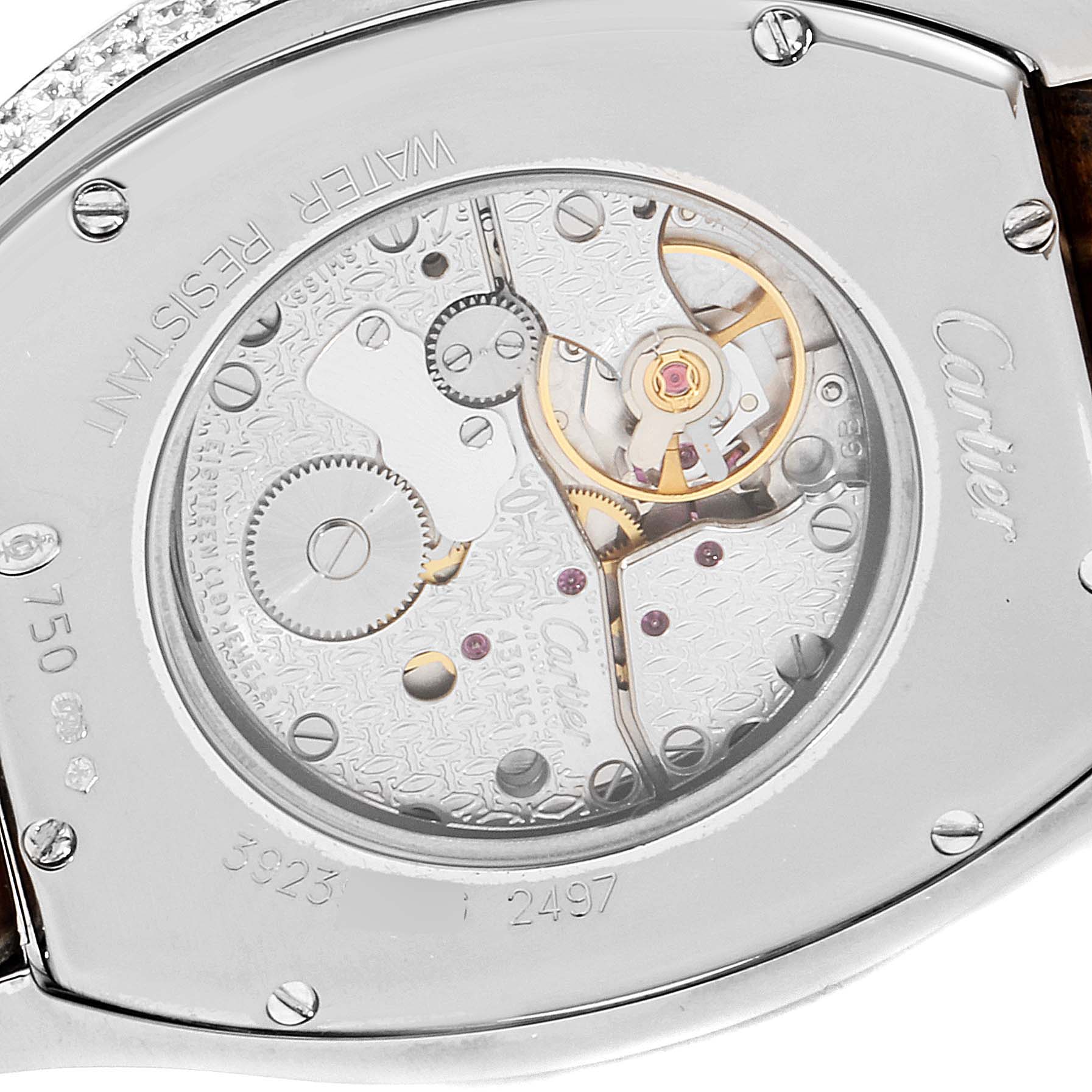 The image shows the back of the Cartier Tortue WA504351 Men's White Gold Silver Dial WA504351 Men's White Gold Silver Dial watch, highlighting its intricate internal mechanisms and engravings.