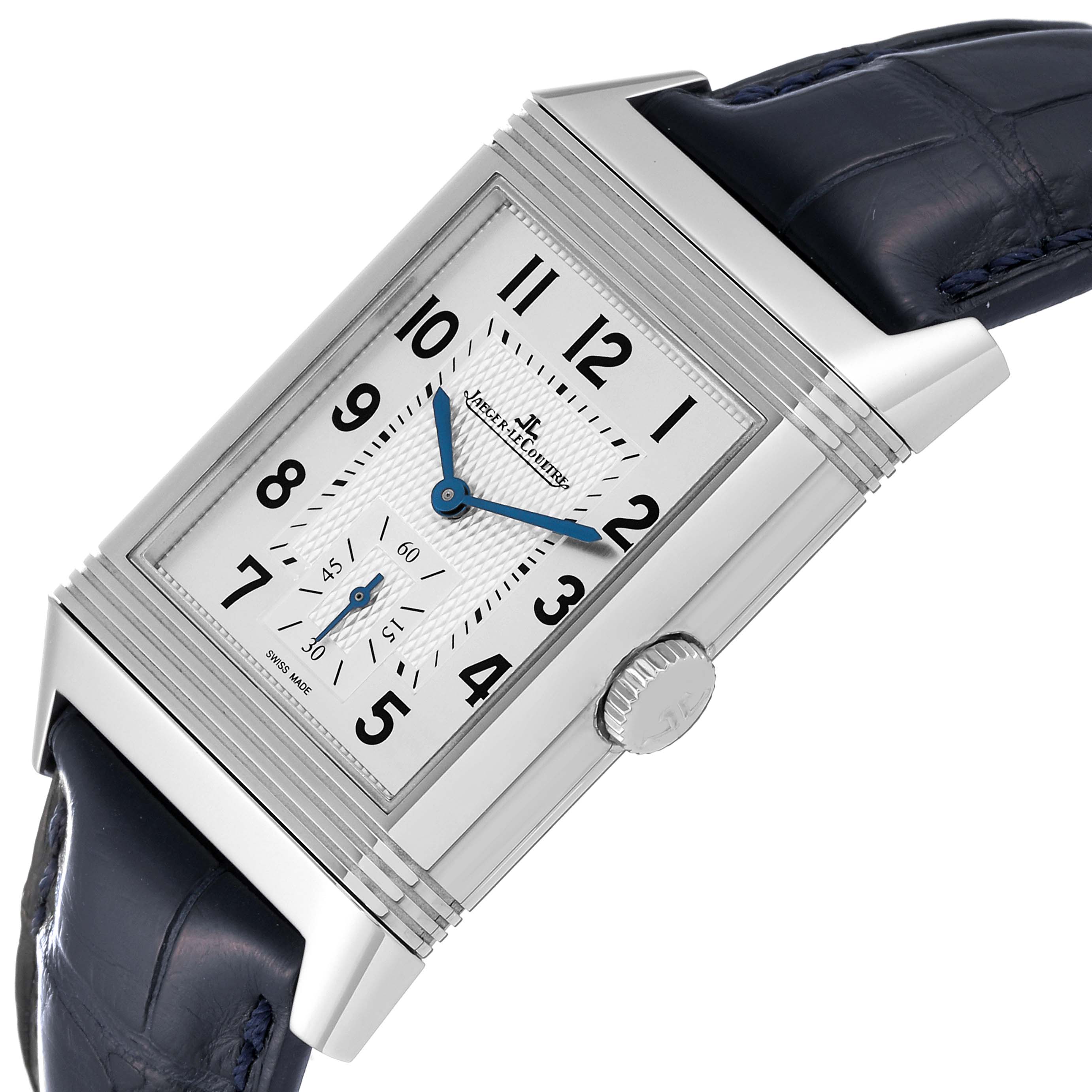 The image shows a close-up of the dial, crown, and strap of the Jaeger LeCoultre Reverso Q3848420 Men's Stainless Steel Silver Dial Q3848420 Men's Stainless Steel Silver Dial watch.