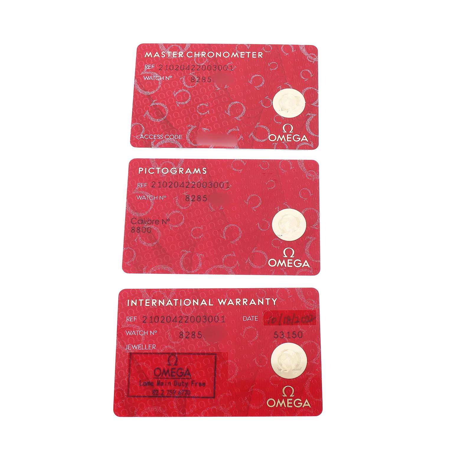 The image shows three red cards for the Omega Seamaster 210.20.42.20.03.001 Men's Steel and Gold (two tone) Blue Dial: a Master Chronometer card, Pictograms card, and International Warranty card.