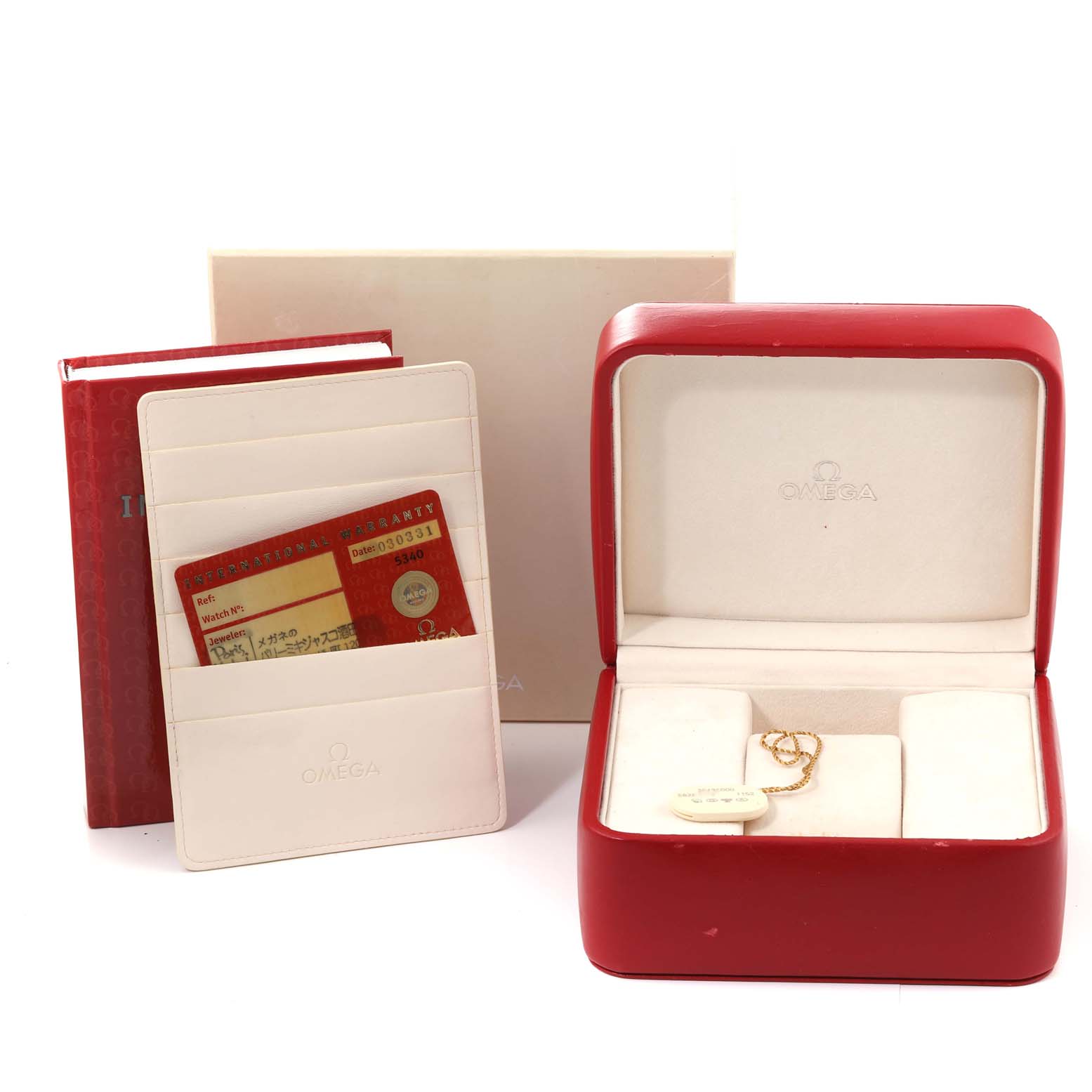 This image shows the packaging and accessories of an Omega Speedmaster 3513.50.00 Men
s Stainless Steel Black Dial 3513.50.00 Men
s Stainless Steel Black Dial, including a red box, warranty cards, and a booklet.