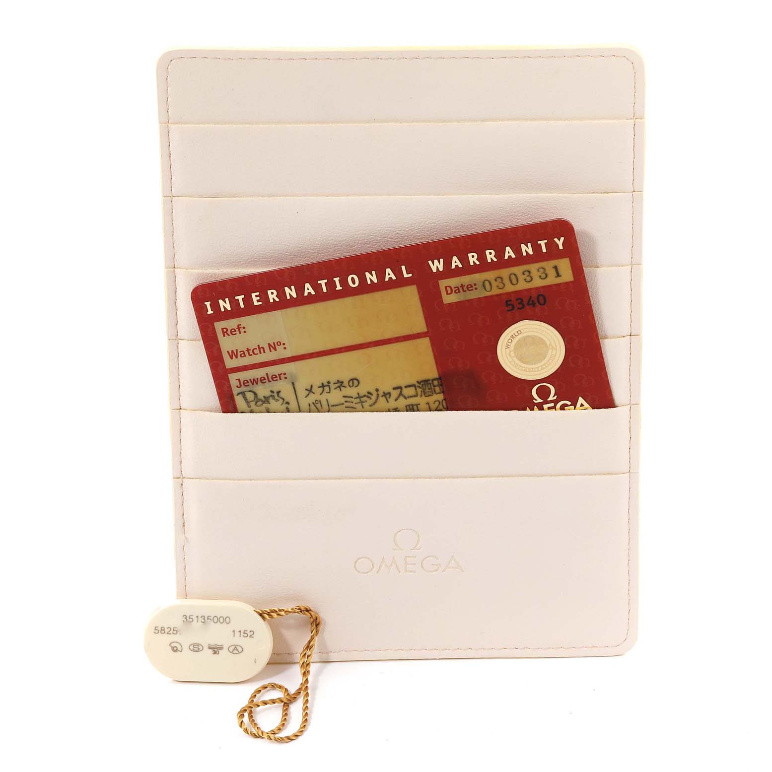 The image shows the warranty card and tags for an Omega Speedmaster 3513.50.00 Men
s Stainless Steel Black Dial 3513.50.00 Men
s Stainless Steel Black Dial watch, placed in a white cardholder.