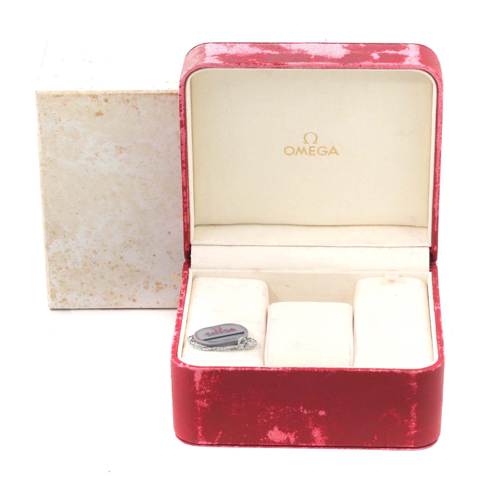 The image shows an empty Omega Speedmaster 3511.80.00 Men
s Stainless Steel Blue Dial 3511.80.00 Men
s Stainless Steel Blue Dial watch box and an accessory inside a worn red velvet case.