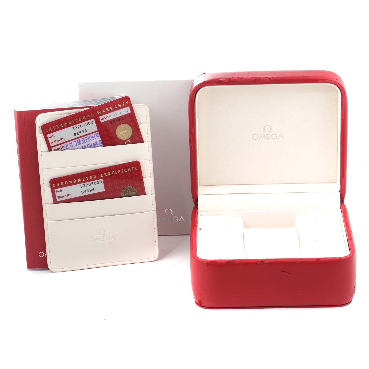 The image shows the packaging and warranty cards for an Omega Speedmaster 3220.50.00 Men
s Stainless Steel Black Dial 3220.50.00 Men
s Stainless Steel Black Dial, including a red watch box and cardholder.