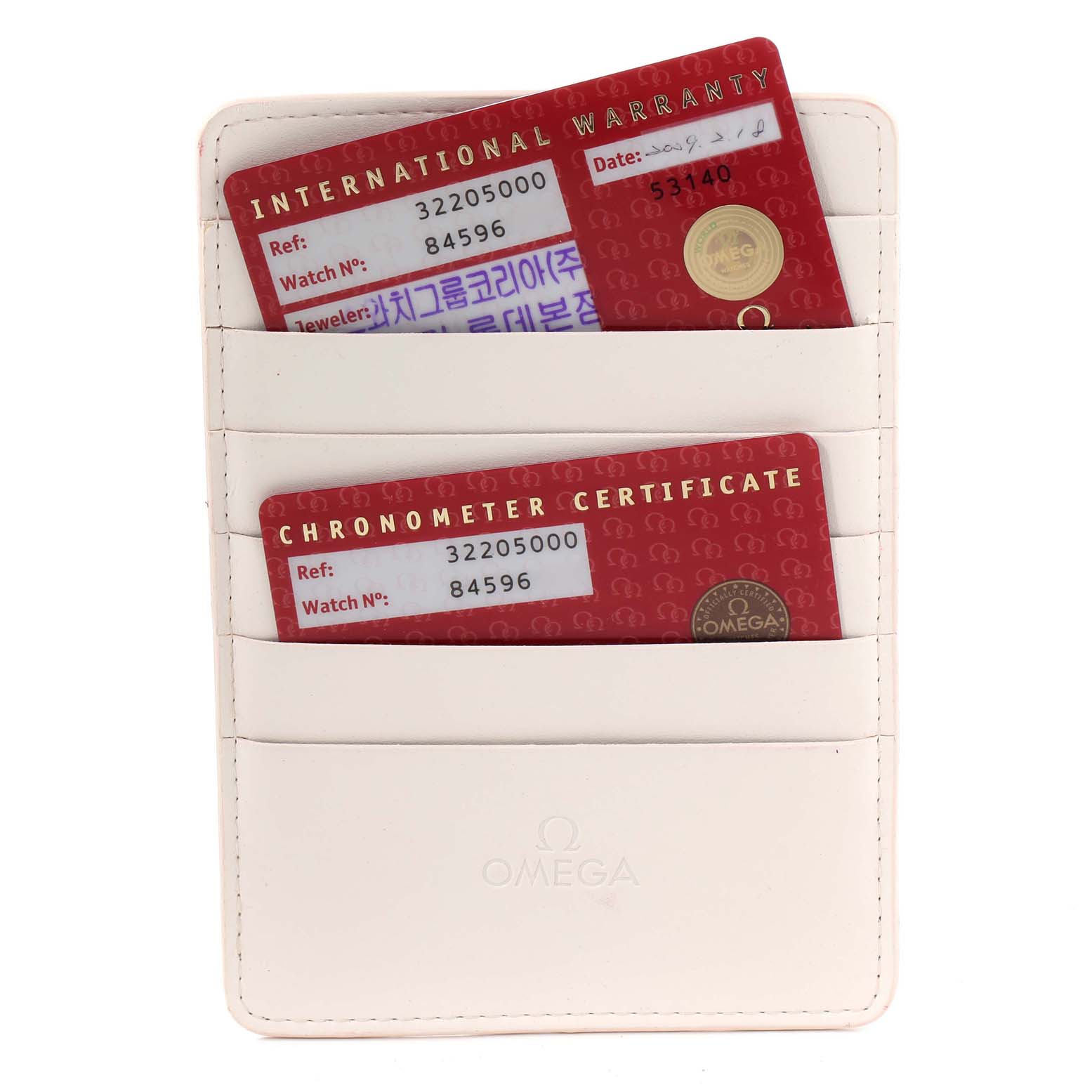 The image shows the warranty and chronometer certificate cards for an Omega Speedmaster 3220.50.00 Men
s Stainless Steel Black Dial 3220.50.00 Men
s Stainless Steel Black Dial, stored in a white cardholder.