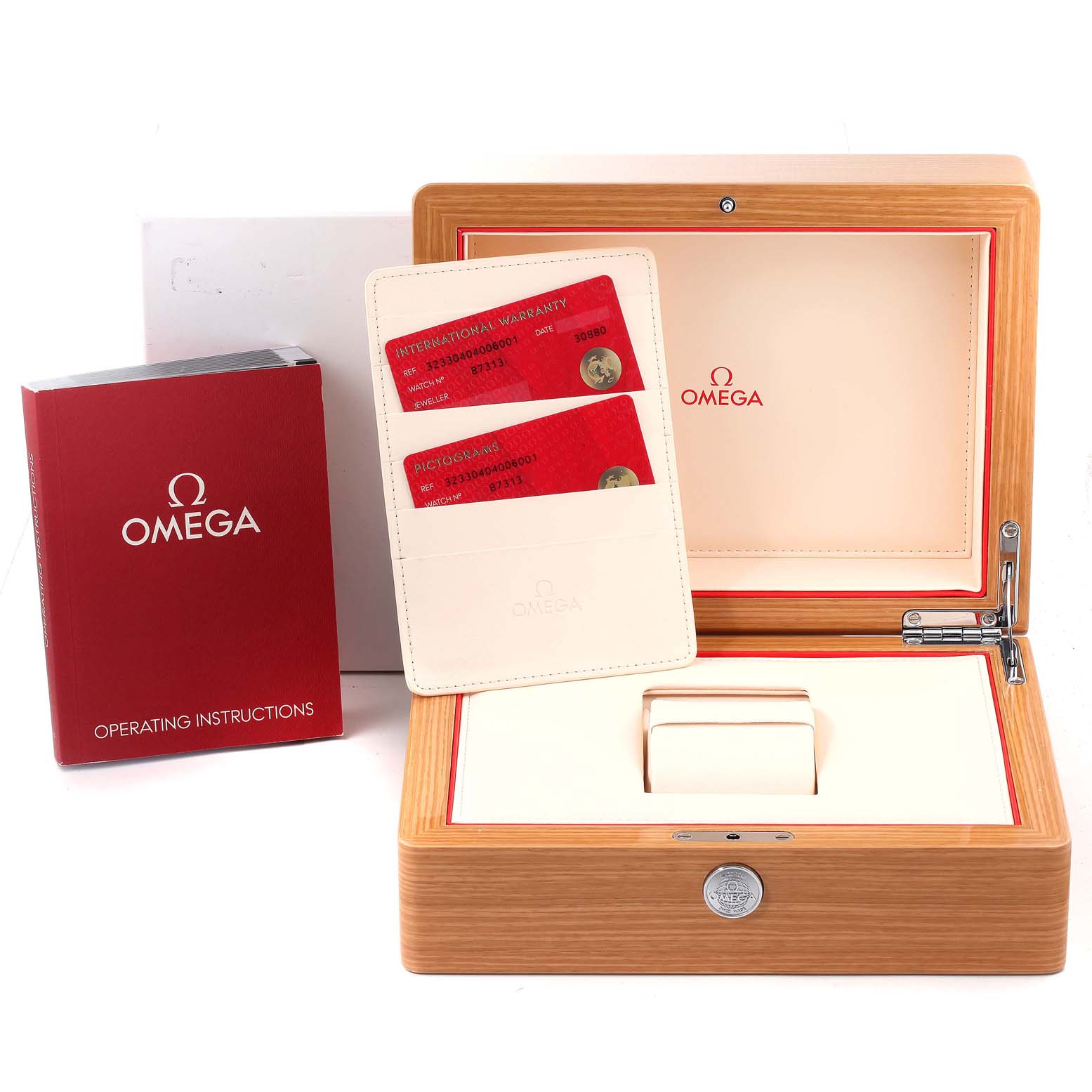 This image shows the packaging, warranty cards, and operating instructions for an Omega Speedmaster 323.30.40.40.06.001 Men's Stainless Steel Grey Dial 323.30.40.40.06.001 Men's Stainless Steel Grey Dial watch.