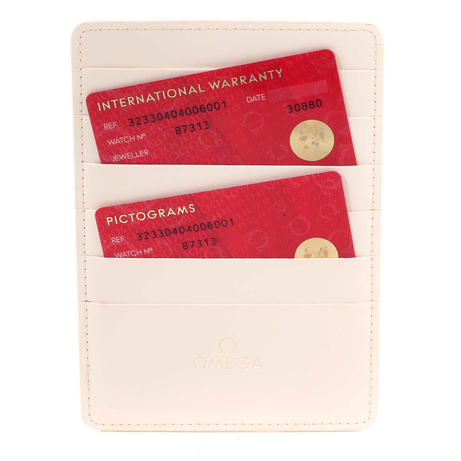 The image shows the Omega Speedmaster 323.30.40.40.06.001 Men's Stainless Steel Grey Dial 323.30.40.40.06.001 Men's Stainless Steel Grey Dial model's international warranty and pictogram cards in a white Omega cardholder.