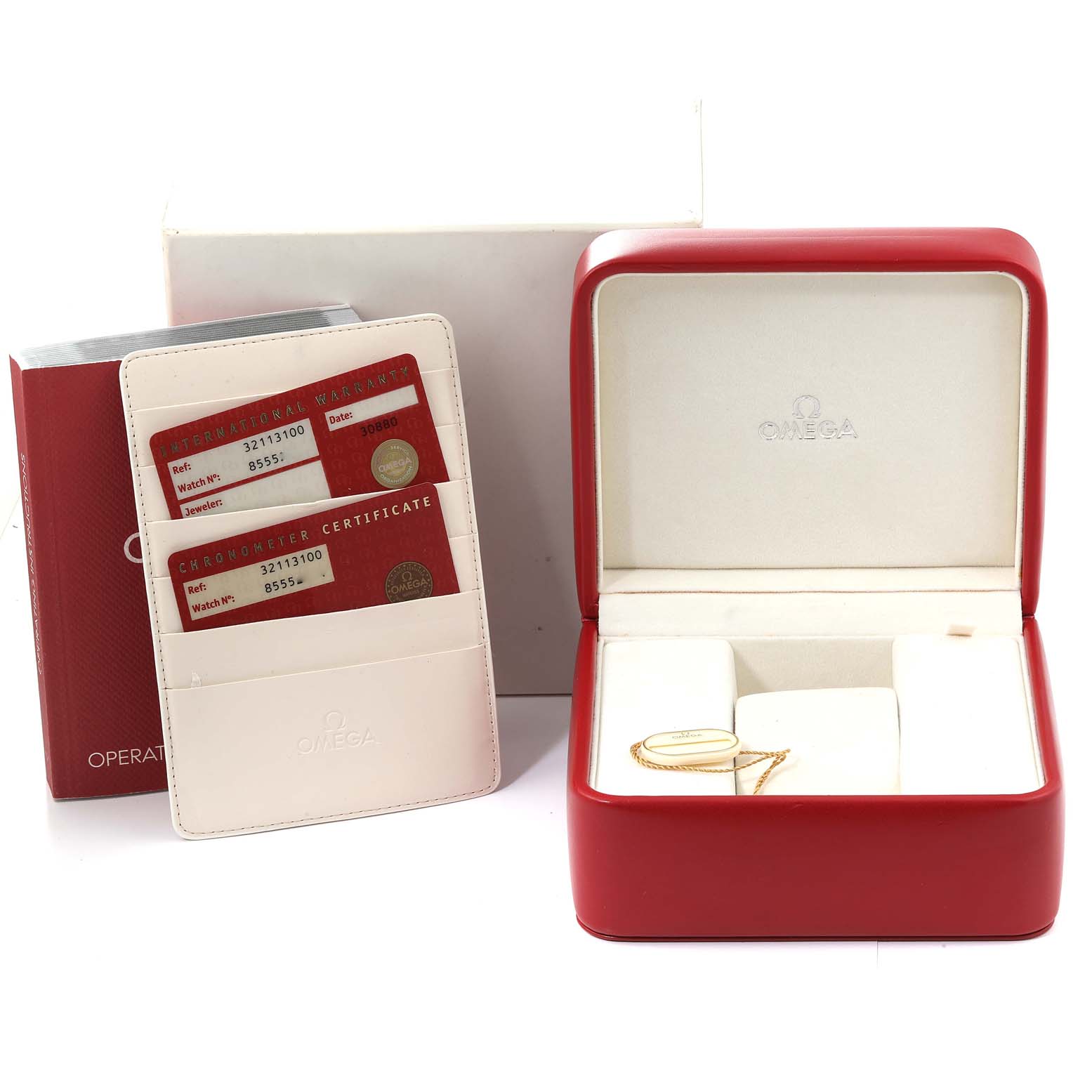 This image shows the accessories for an Omega Speedmaster 3211.31.00 Men
s Stainless Steel Silver Dial 3211.31.00 Men
s Stainless Steel Silver Dial watch including a red watch box, certificates, and an instruction manual.