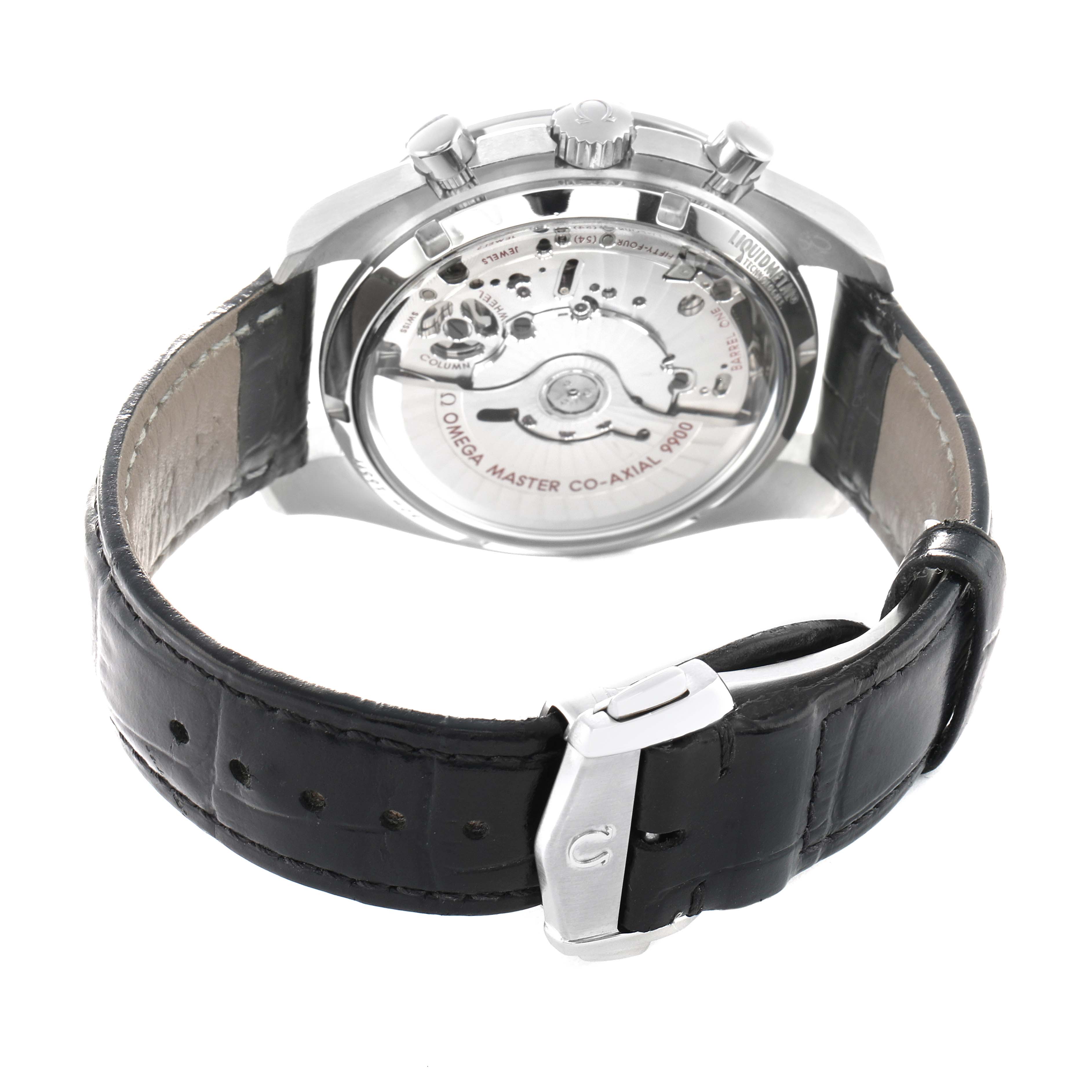 The Omega Speedmaster 329.33.44.51.01.001 Men's Stainless Steel Black Dial watch is shown from the rear, displaying its transparent case back and leather strap with a clasp.