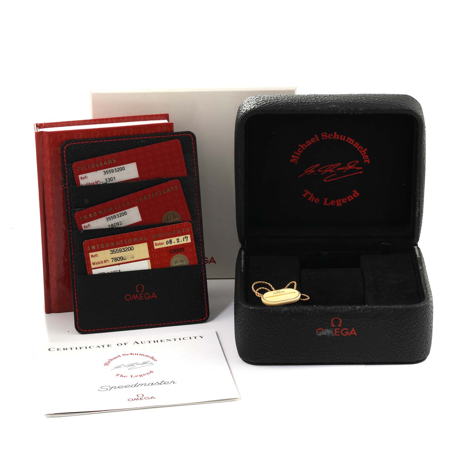 The image shows the packaging, cards, and certificate for an Omega Speedmaster 3559.32.00 Men's Stainless Steel Silver Dial 3559.32.00 Men's Stainless Steel Silver Dial watch at a frontal angle.