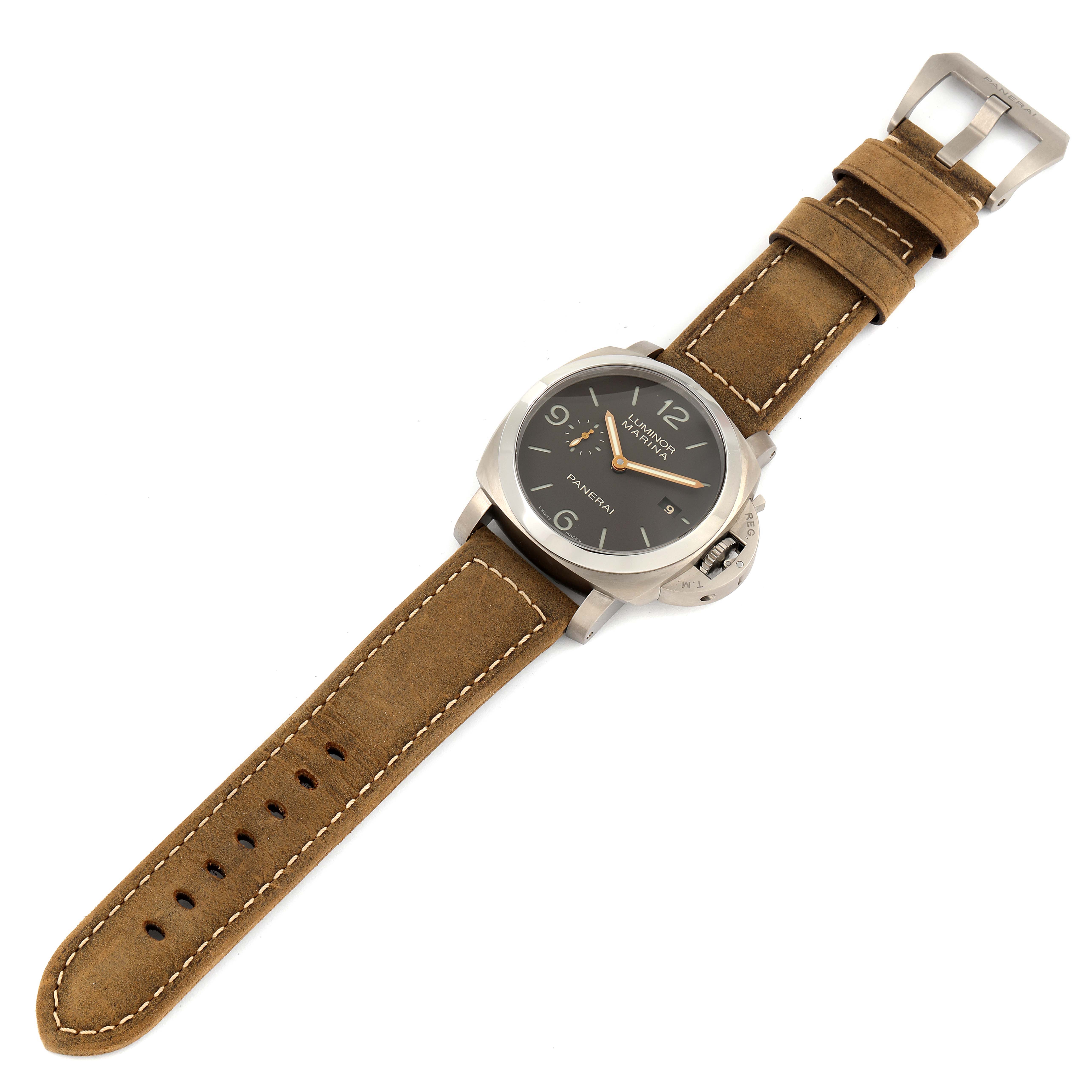 The image shows a Panerai Luminor PAM00351 Men
s Titanium Black Dial PAM00351 Men
s Titanium Black Dial watch laid flat, displaying its face, case, crown guard, and leather strap.