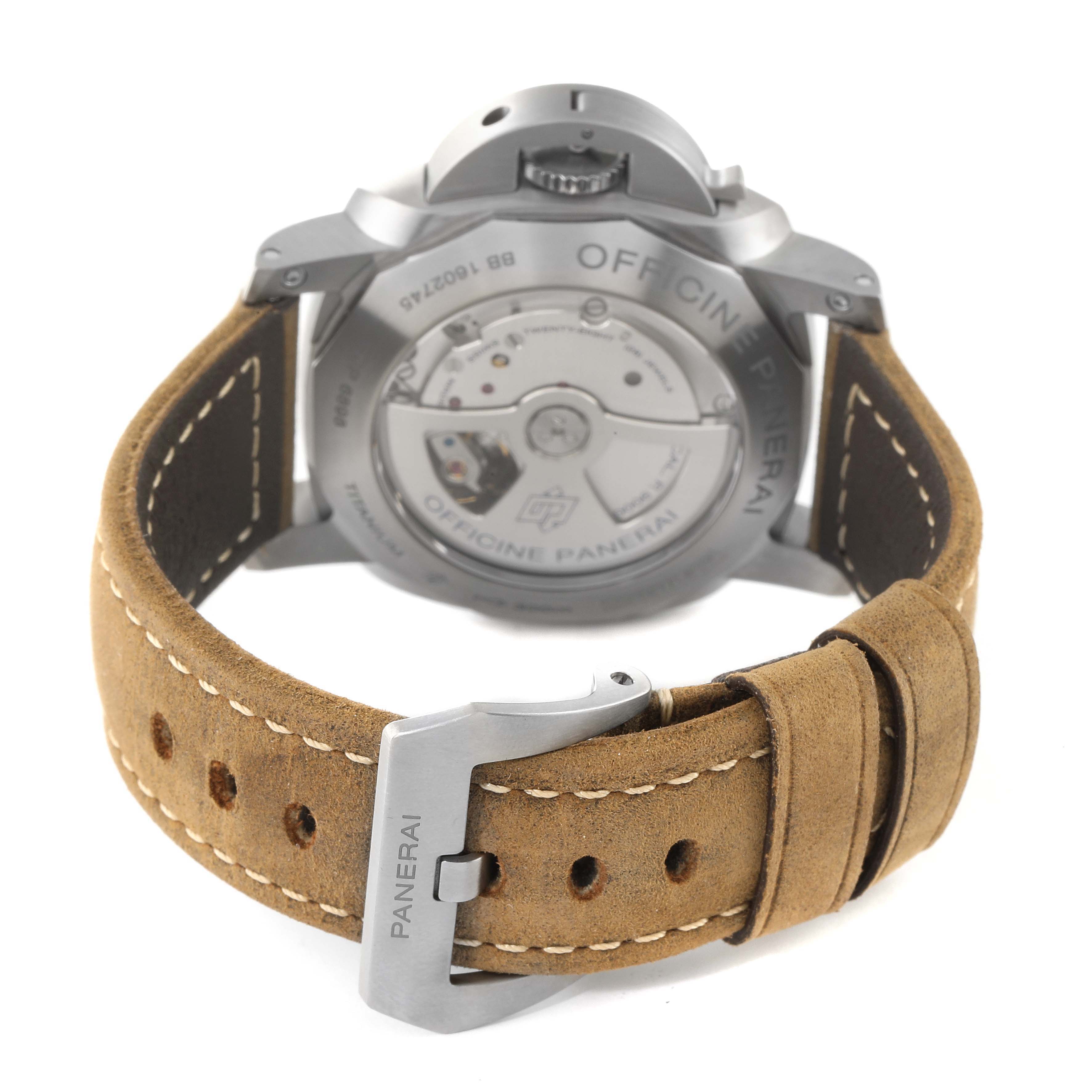 The image shows the back view of a Panerai Luminor PAM00351 Men
s Titanium Black Dial PAM00351 Men
s Titanium Black Dial watch, displaying the buckle and mechanical movements.