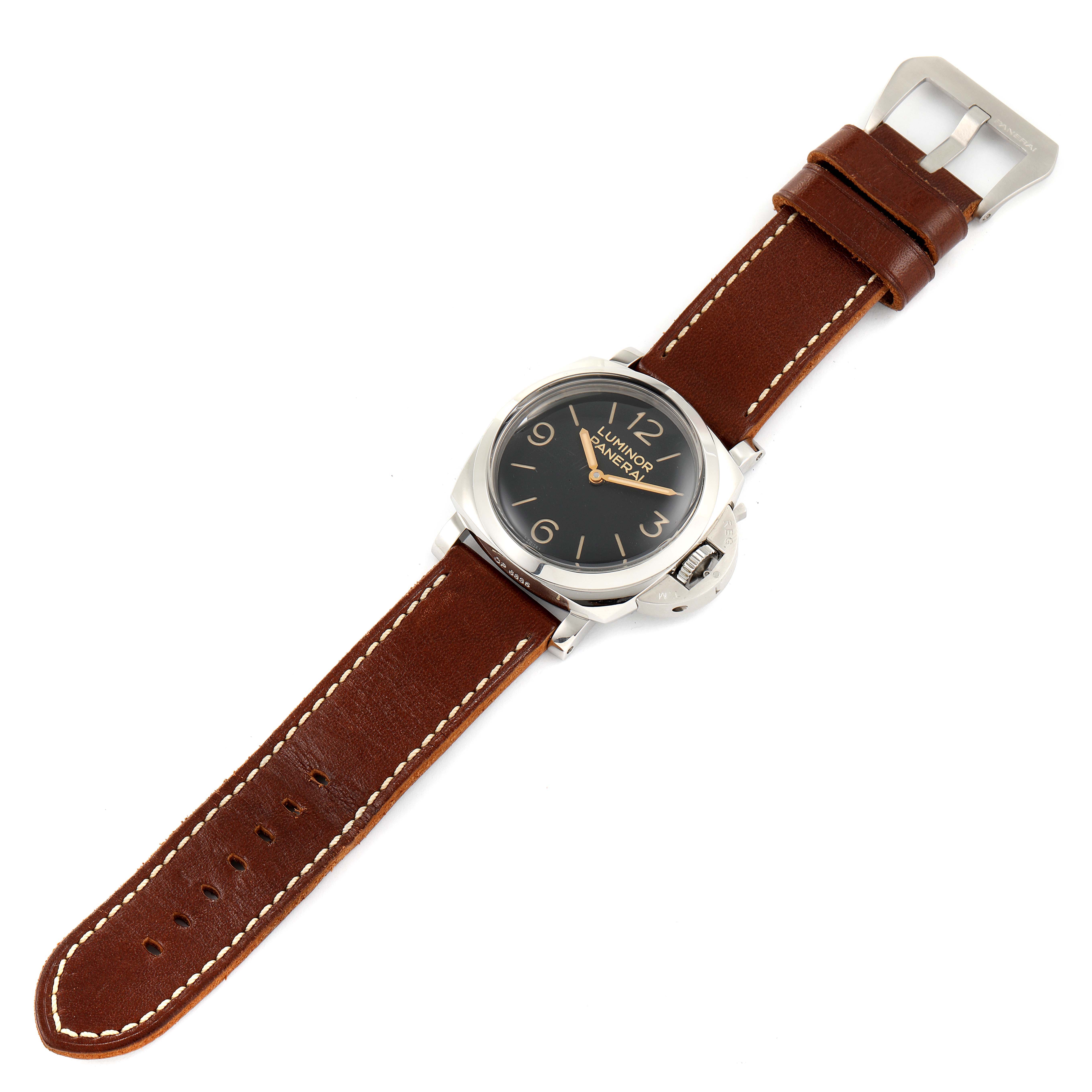 The Panerai Luminor PAM00372 Men
s Stainless Steel Black Dial PAM00372 Men
s Stainless Steel Black Dial watch is shown from a top-down angle, displaying the face, case, crown guard, and leather strap.