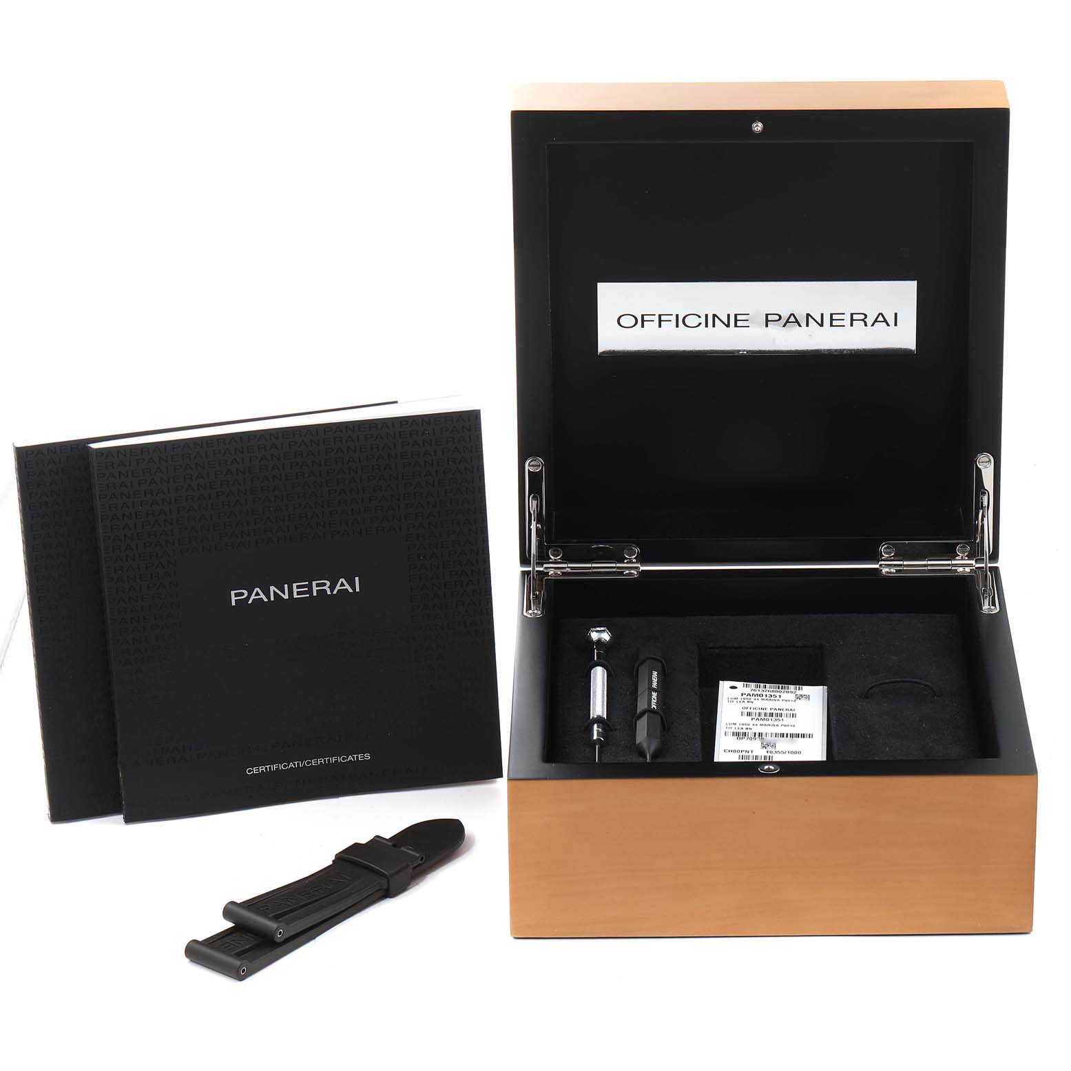 The image shows a Panerai Luminor PAM01351 Men's Titanium Brown Dial PAM01351 Men's Titanium Brown Dial watch box, additional strap, booklets, and tools from a top-down angle.