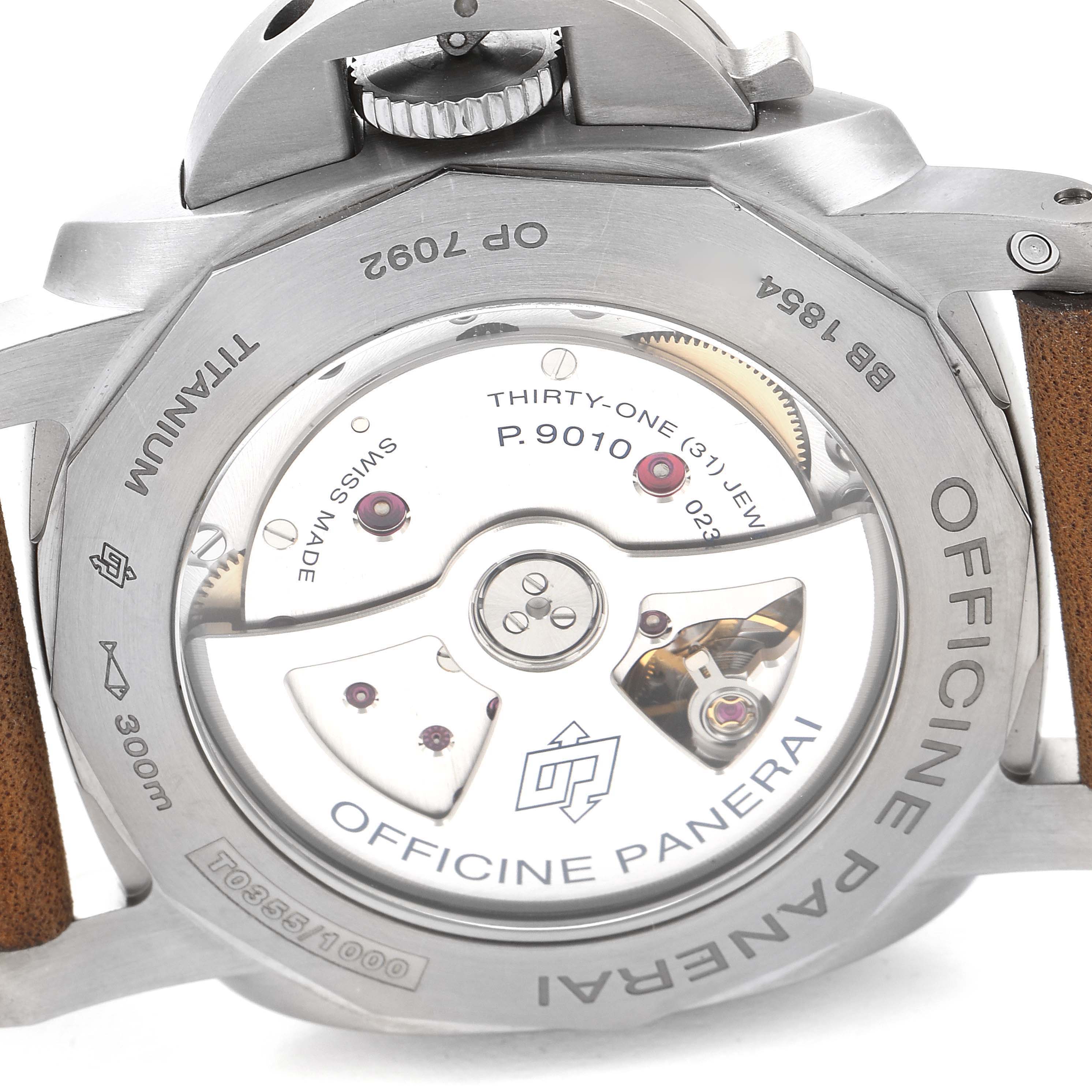 This image shows the back of a Panerai Luminor PAM01351 Men's Titanium Brown Dial PAM01351 Men's Titanium Brown Dial watch, highlighting the P.9010 movement mechanism and "Officine Panerai" engraving.