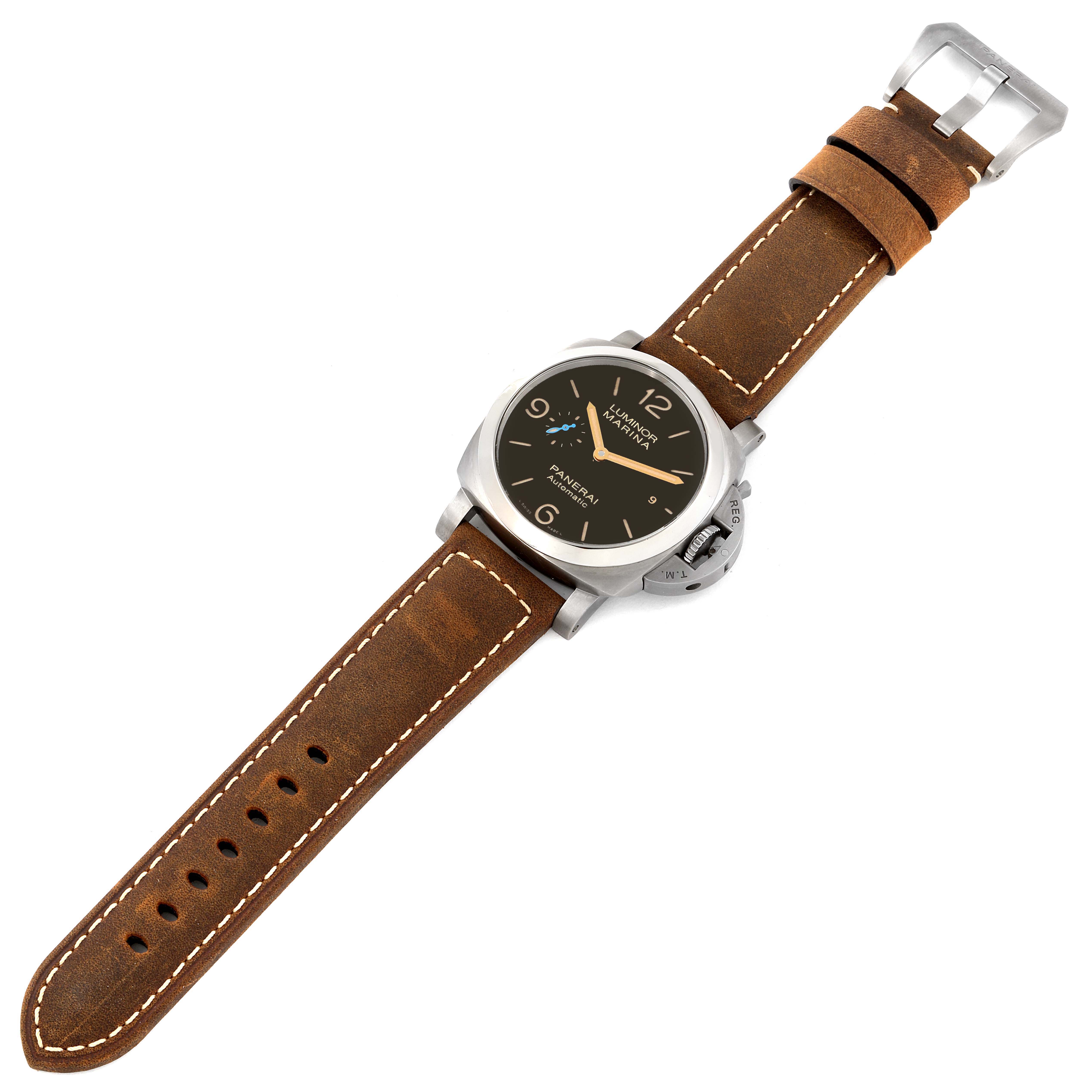The image shows an angled top-down view of a Panerai Luminor PAM01351 Men's Titanium Brown Dial PAM01351 Men's Titanium Brown Dial watch displaying its face, case, and brown leather strap.