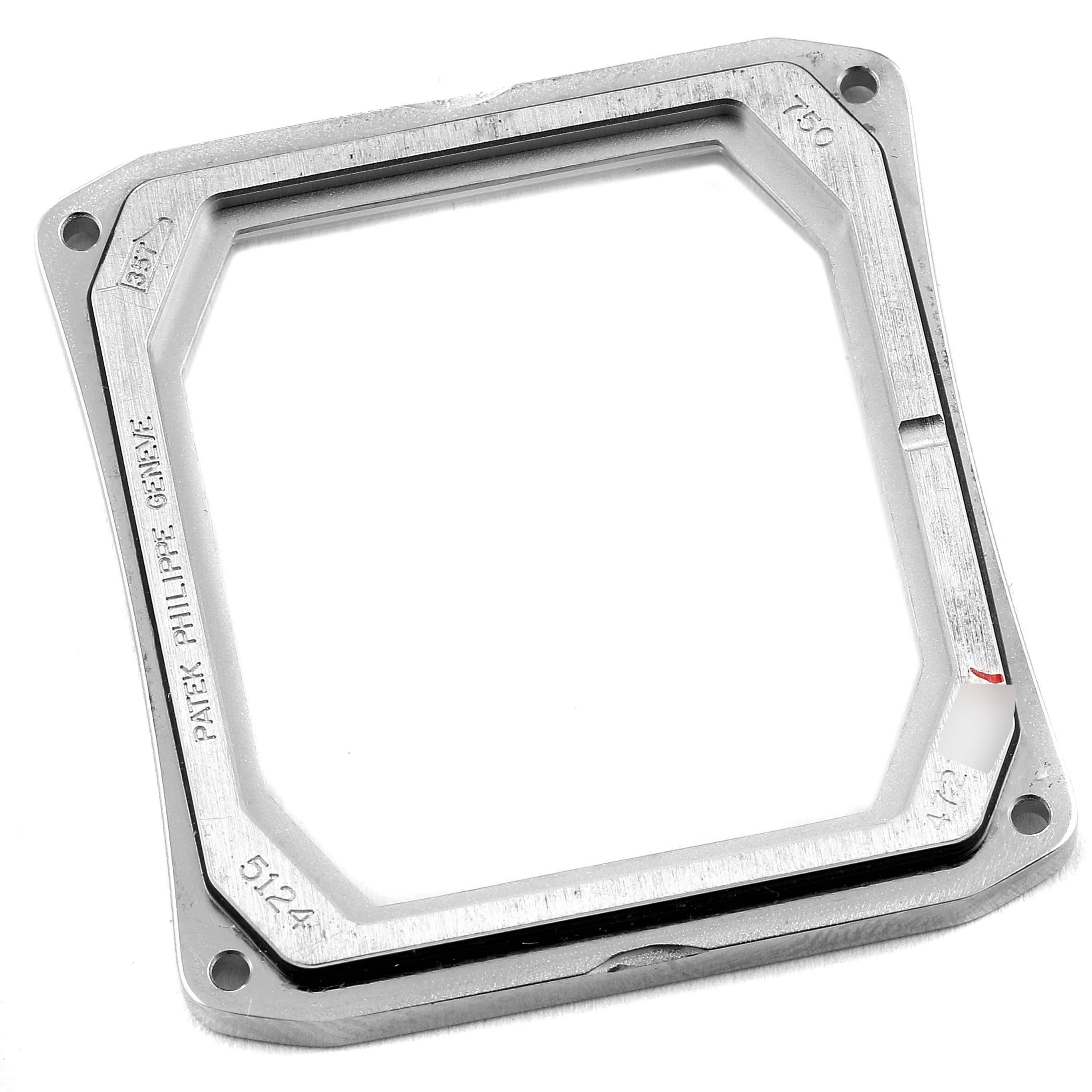 This image shows the metal frame case of the Gondolo model by Patek Philippe from a top-down angle.