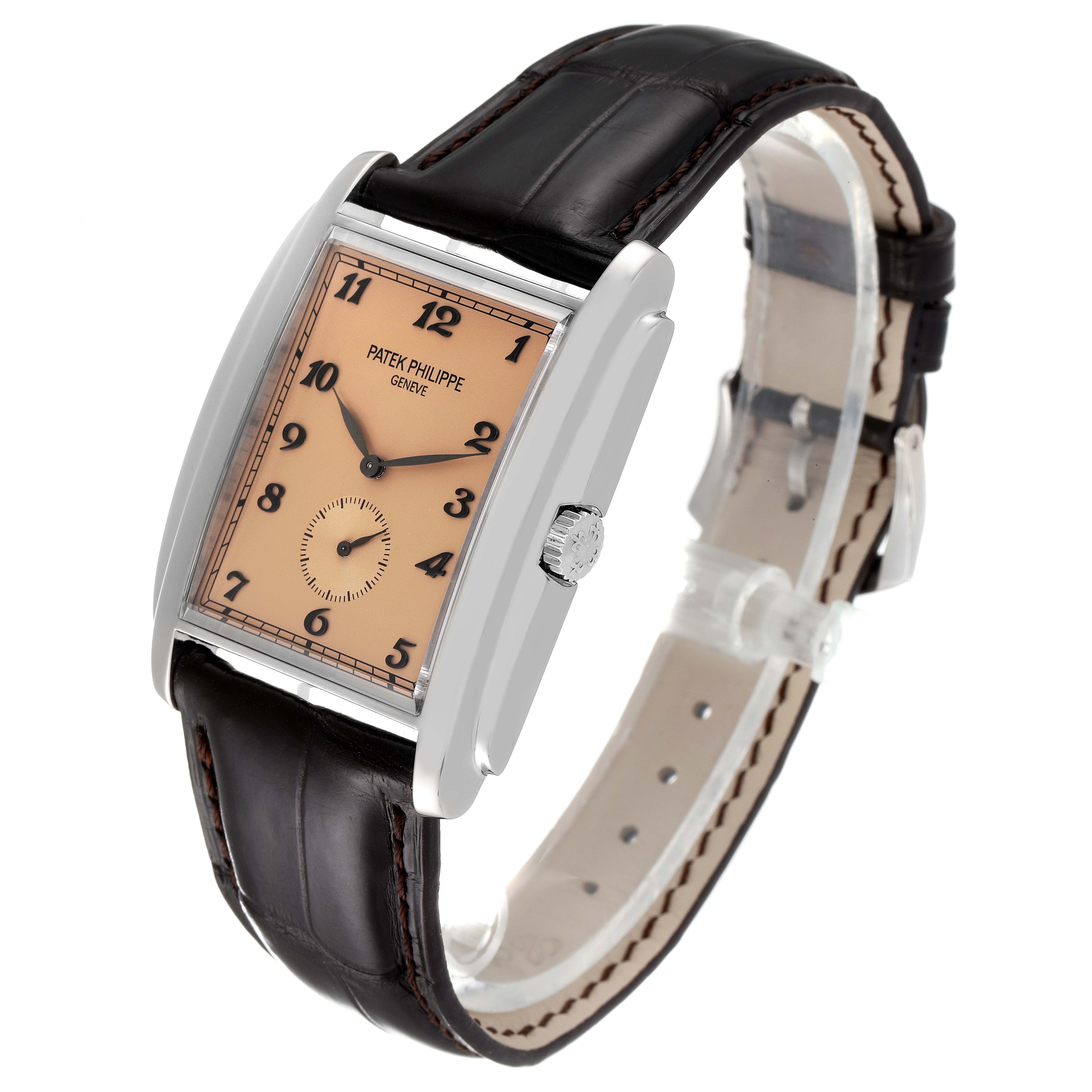 The image shows a Patek Philippe Gondolo 5124G-001 Men's White Gold Pink Dial 5124G-001 Men's White Gold Pink Dial watch from a three-quarter angle, highlighting the dial, crown, and leather strap.