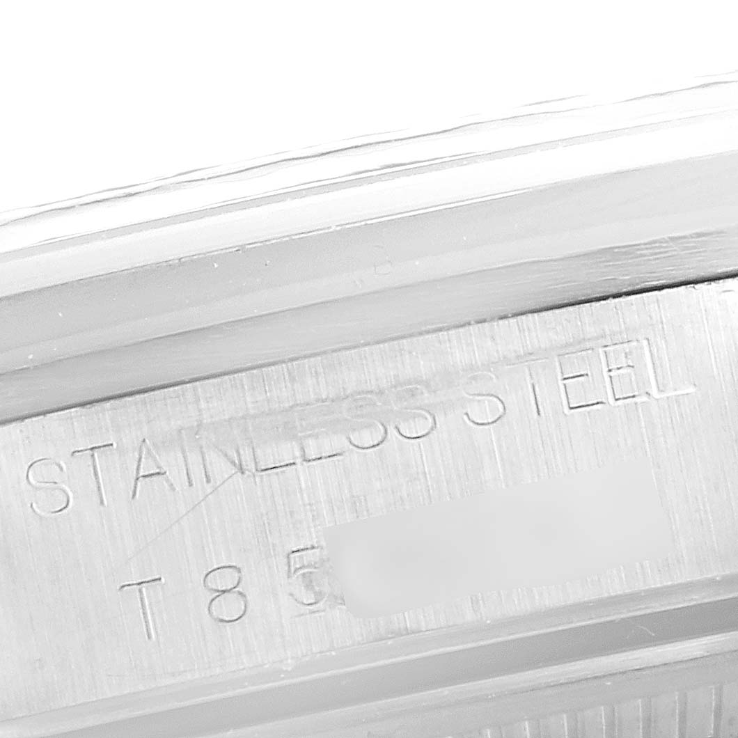 This close-up image shows a portion of the back of a stainless steel Rolex Air-King 14000 Men's Stainless Steel Silver Dial 14000 Men's Stainless Steel Silver Dial watch case.