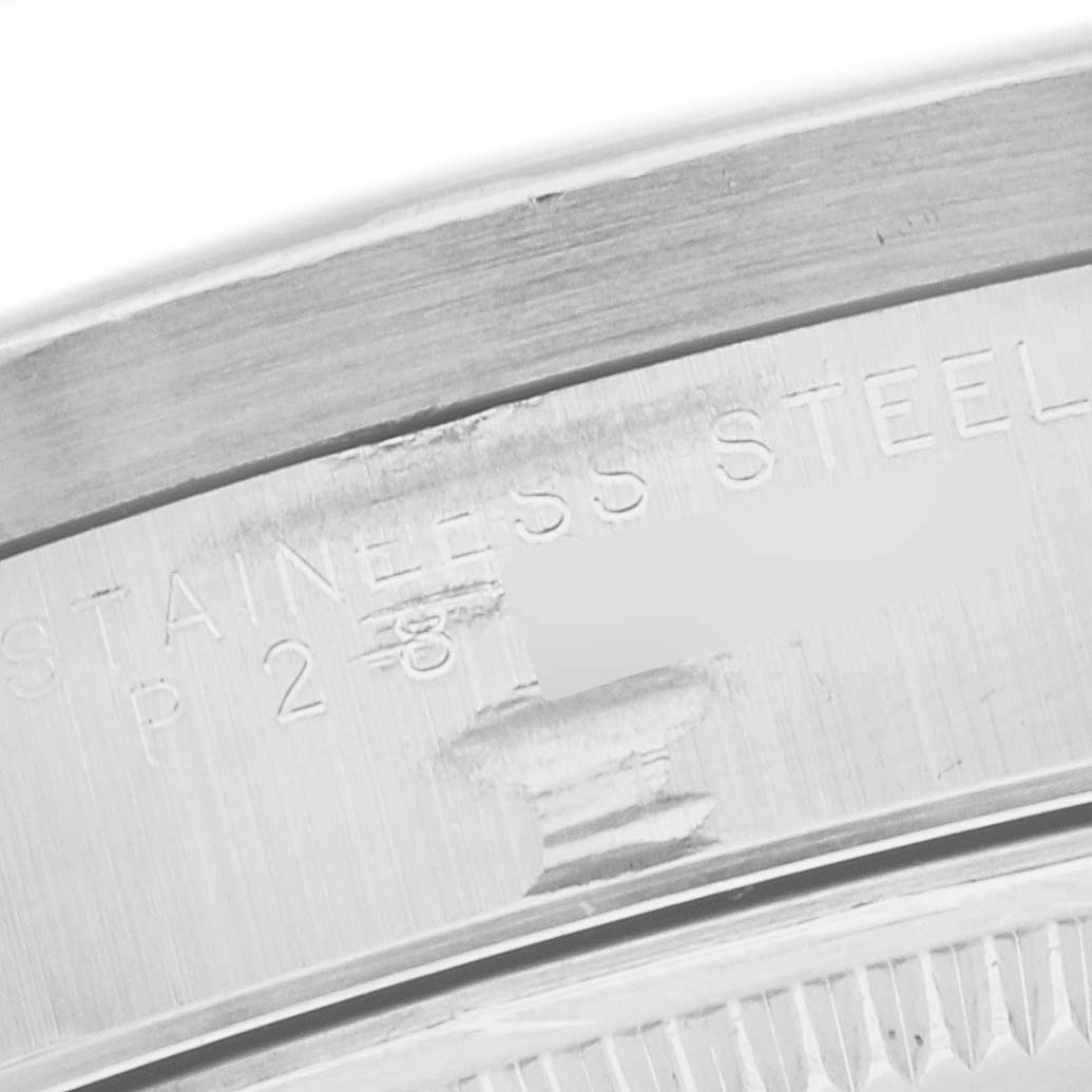 The image shows a close-up of the case back of a Rolex Air-King 14010 Men's Stainless Steel Blue Dial 14010 Men's Stainless Steel Blue Dial watch, highlighting the stainless steel engraving.