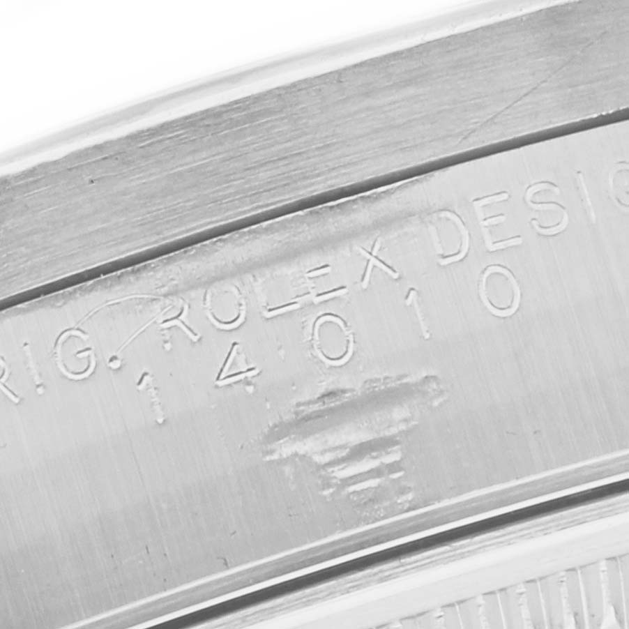 This image shows a close-up of the engraved case back of a Rolex Air-King 14010 Men's Stainless Steel Blue Dial 14010 Men's Stainless Steel Blue Dial watch, displaying its model number.