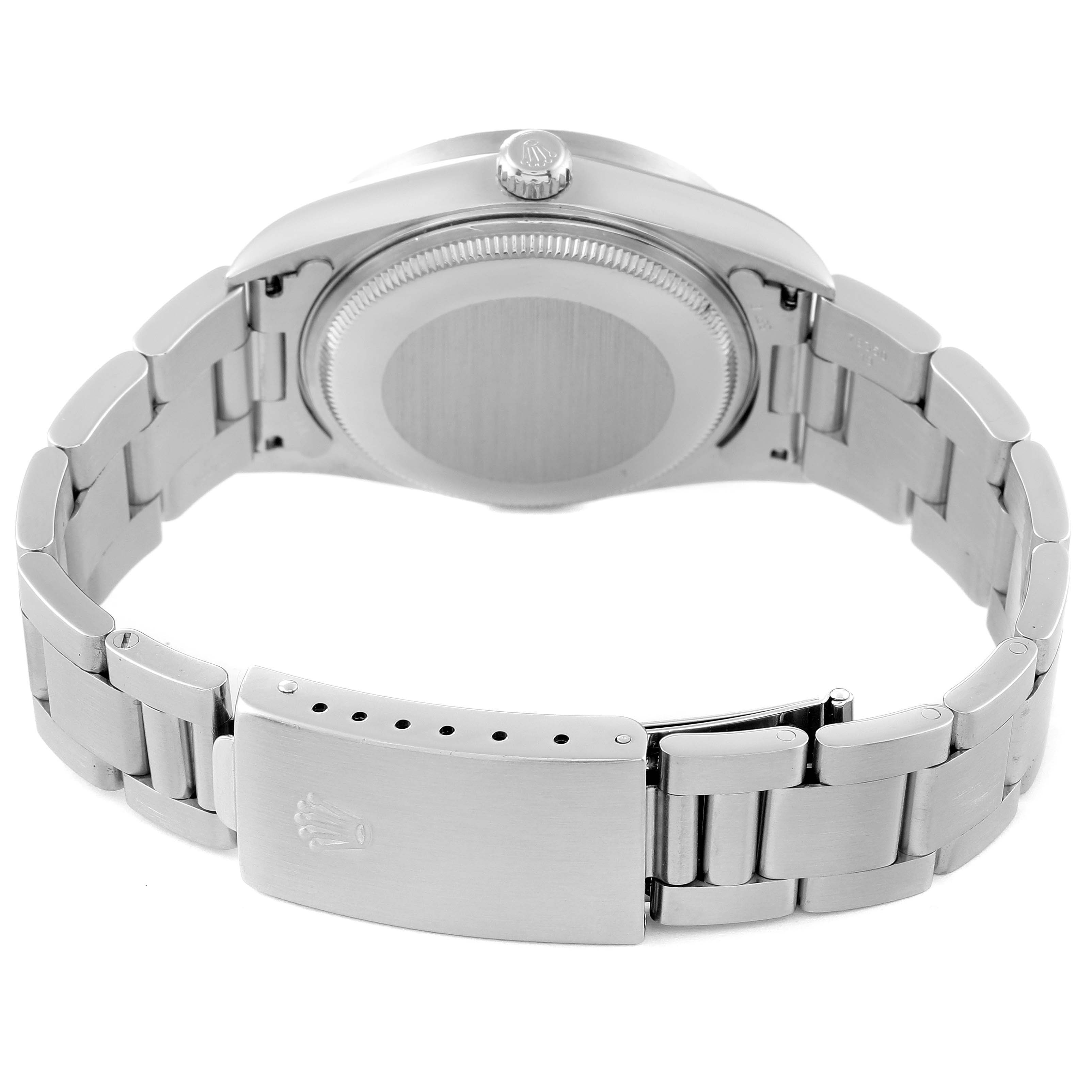 The image shows the back view of a Rolex Air-King 14010 Men's Stainless Steel Blue Dial 14010 Men's Stainless Steel Blue Dial watch, focusing on its case back, crown, and metal bracelet with clasp.