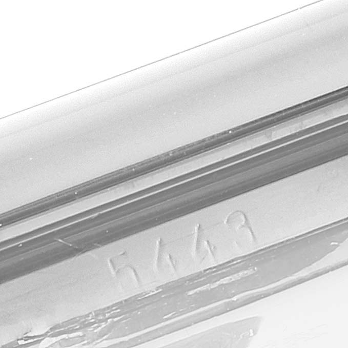 This image shows a close-up of the caseback and part of the band of a Rolex Cellini 5443/9 Men's White Gold Black Dial 5443/9 Men's White Gold Black Dial watch, with some engraved numbers visible.