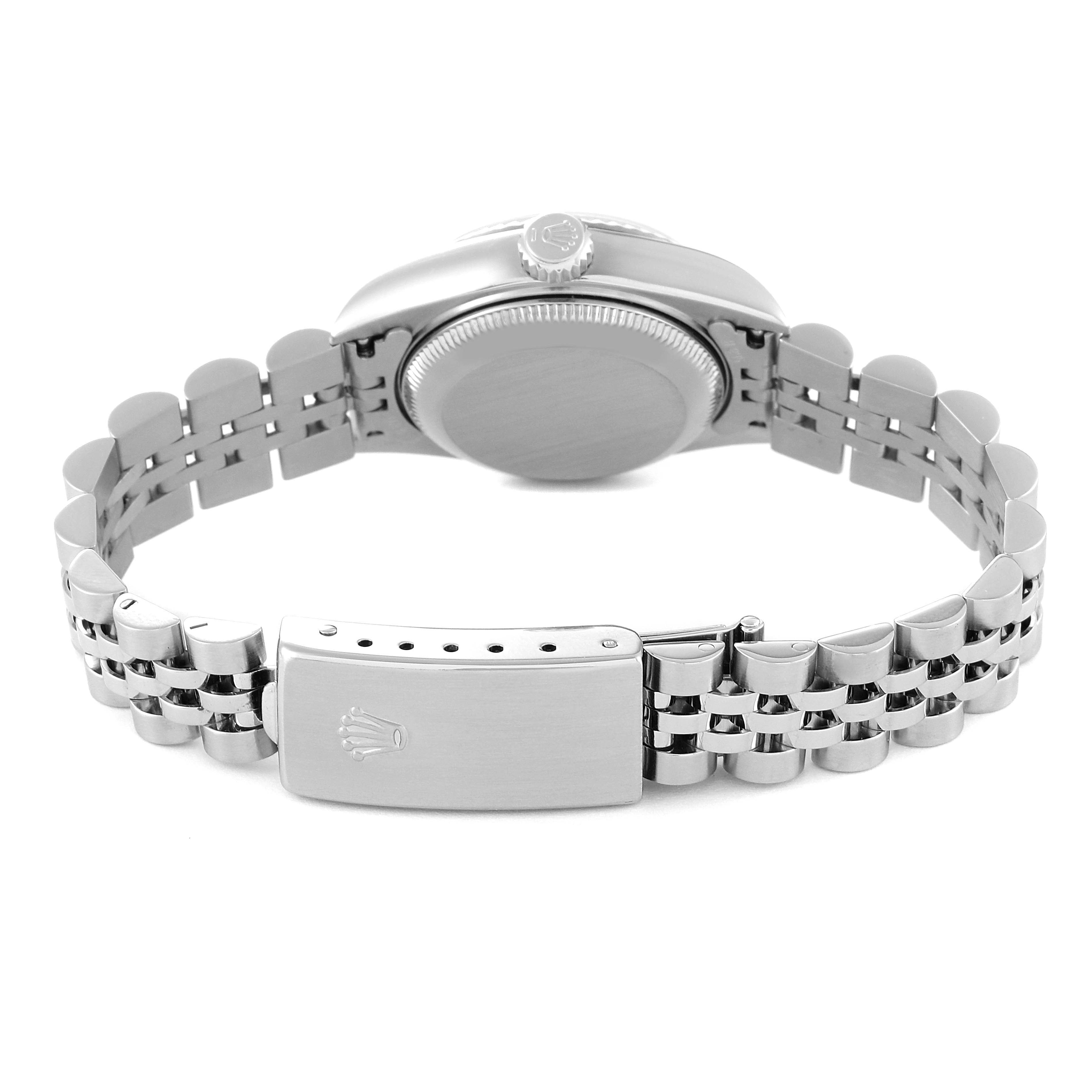 The image shows the back view of a Rolex Datejust 79174 Women's Stainless Steel Silver Dial 79174 Women's Stainless Steel Silver Dial watch, highlighting the case back, crown, and bracelet with the clasp.