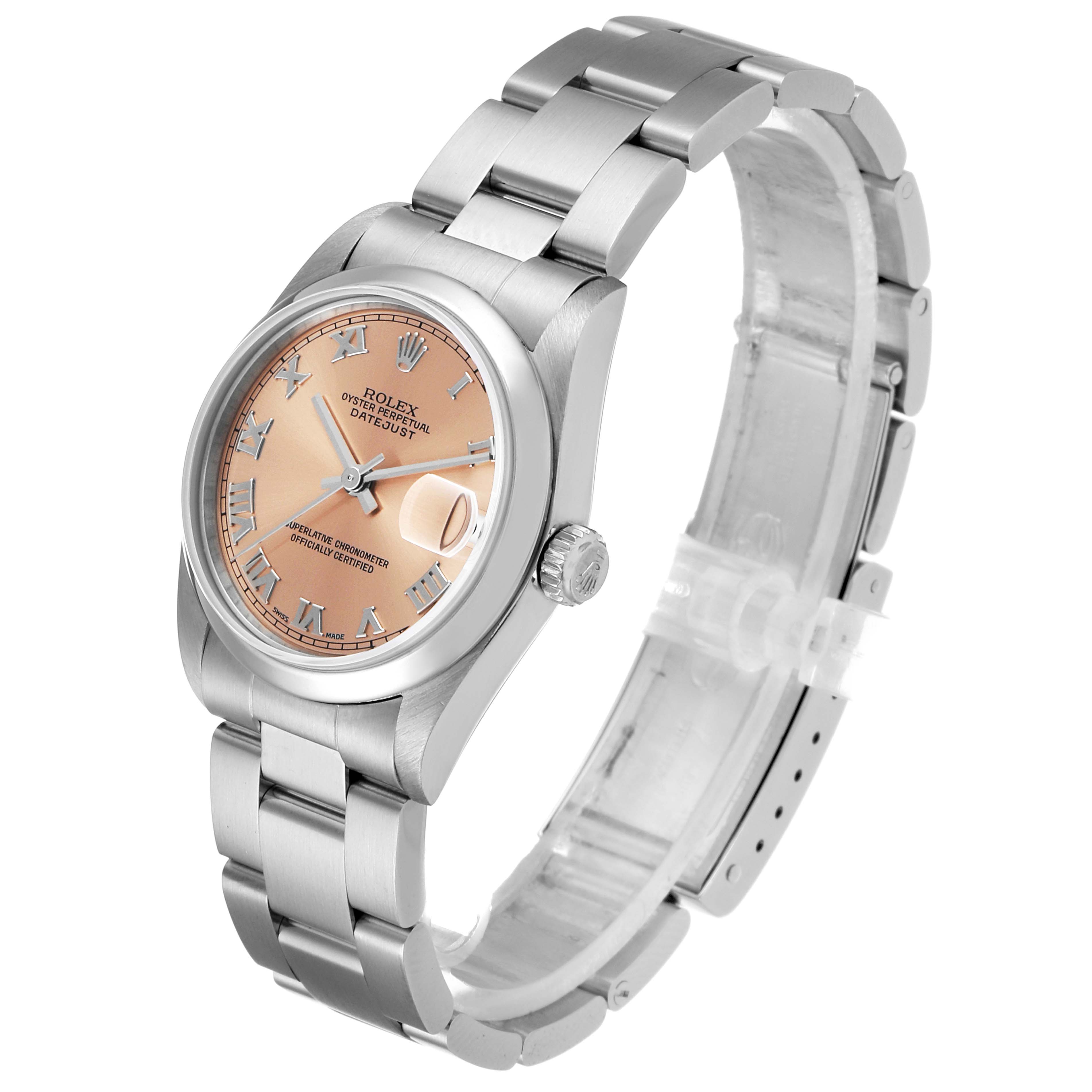 The image shows a side and front angle of a Rolex Mid-Size 78240 Women's Stainless Steel Pink Dial 78240 Women's Stainless Steel Pink Dial Datejust watch with a stainless steel bracelet and peach dial.