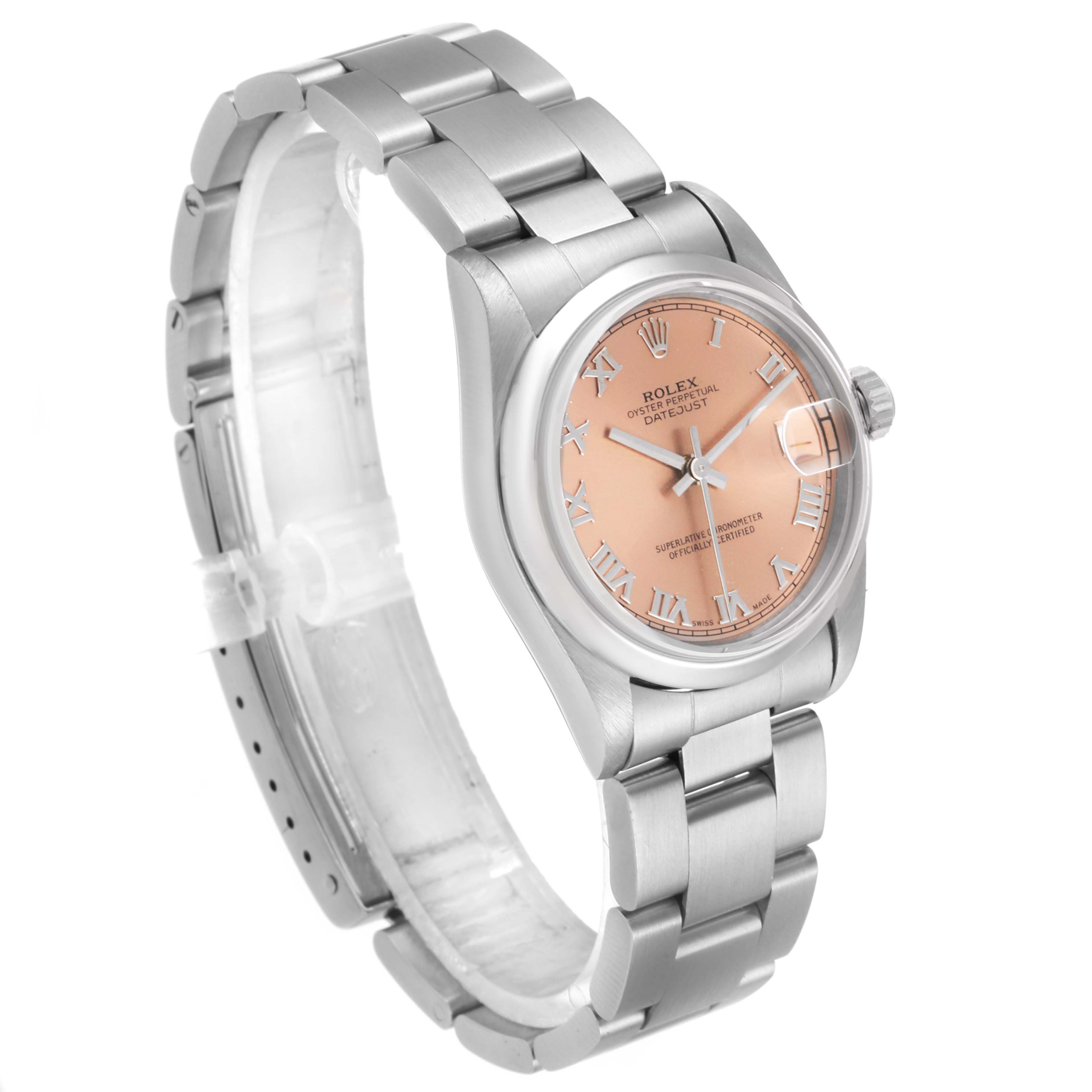 The Mid-Size Rolex watch is shown at a three-quarter angle, highlighting its bracelet, dial, and crown.