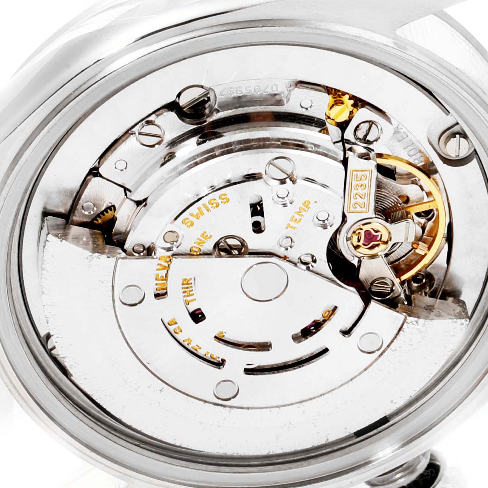 The image shows the internal movement mechanism of a Mid-Size Rolex watch from a close-up, top-down angle.