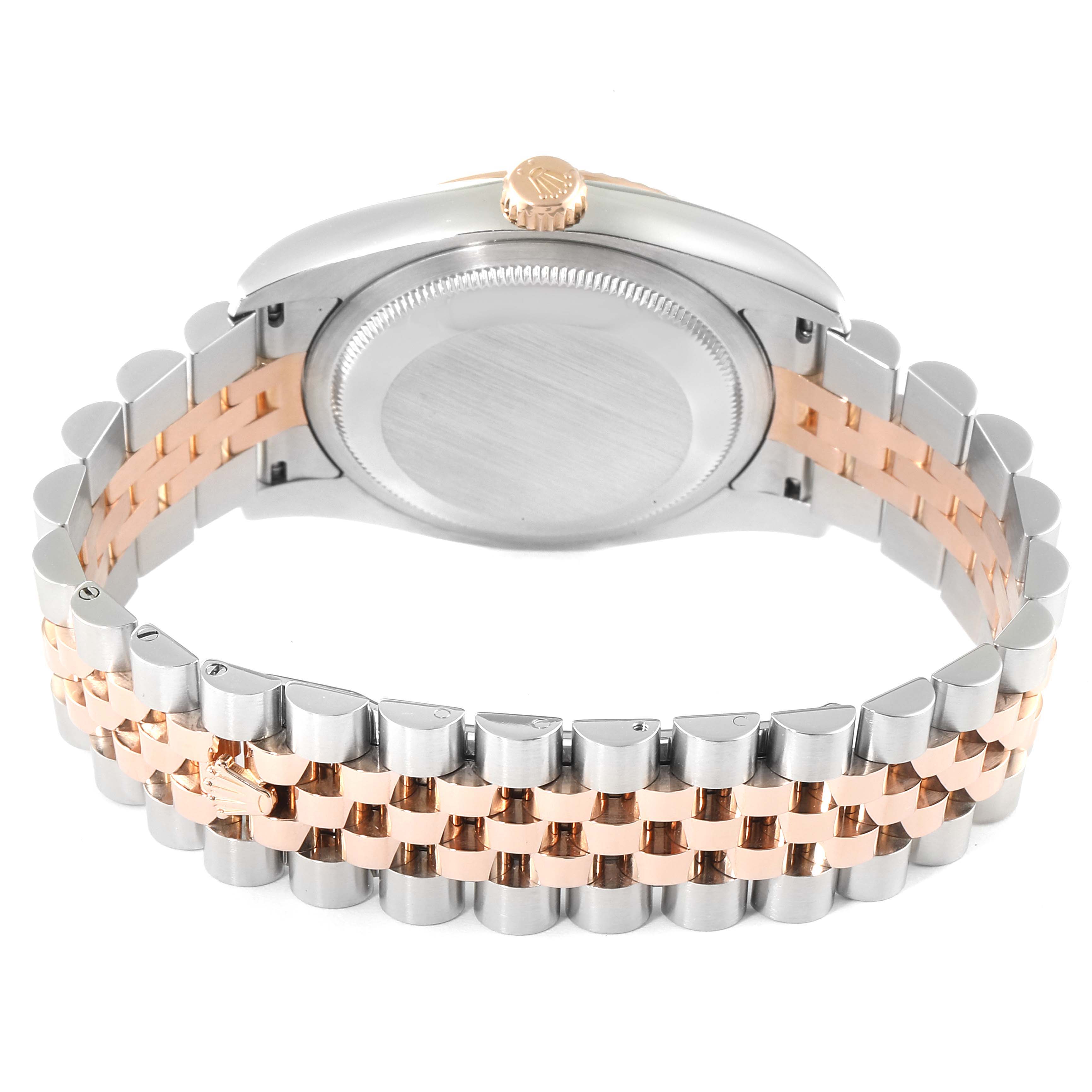This image shows the backside of a Rolex Datejust 116231 Men's Steel and Gold (two tone) Silver Dial 116231 Men's Steel and Gold (two tone) Silver Dial watch, highlighting the bracelet and case back from an angle.