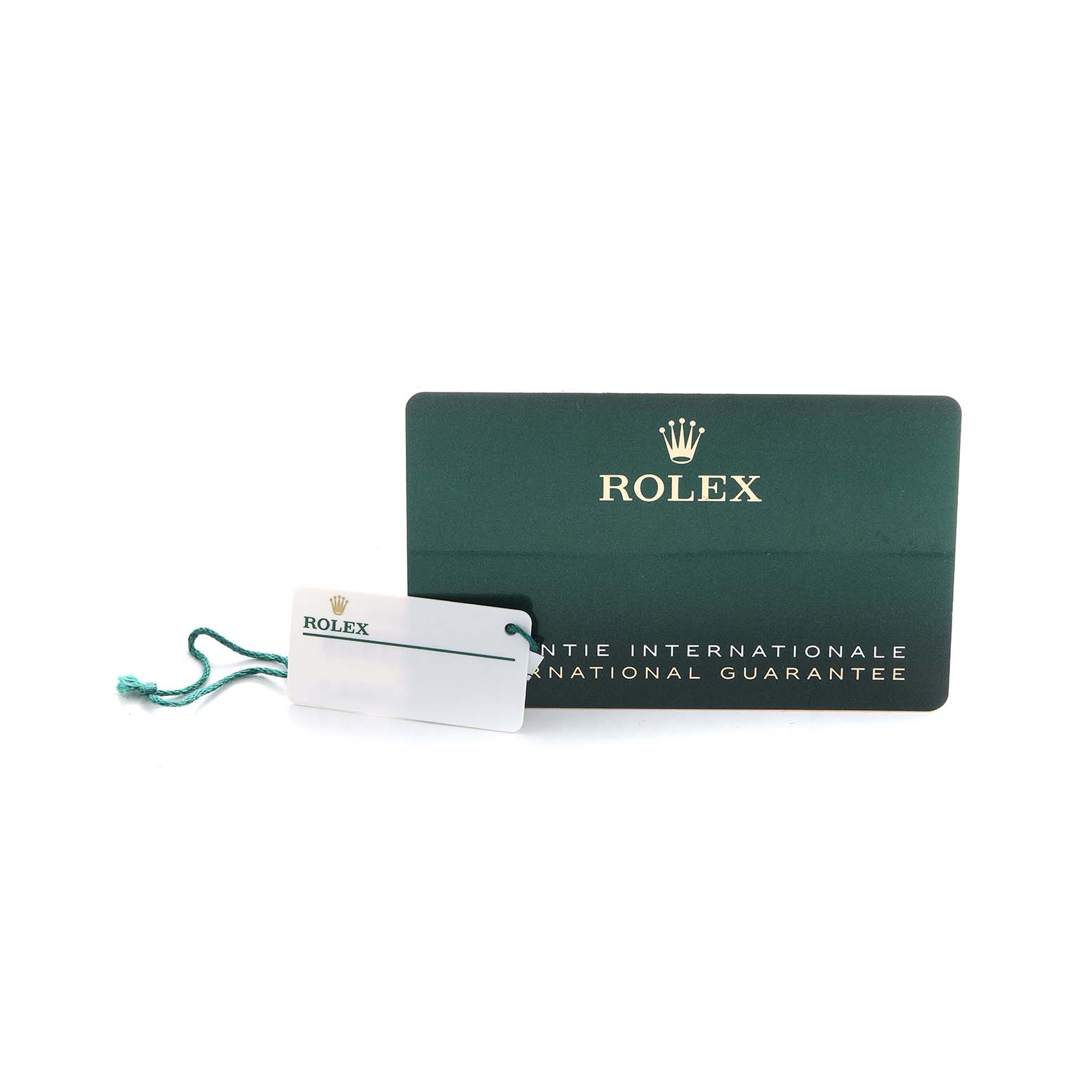 The image shows a Rolex Datejust 41 126301 Men's Steel and Gold (two tone) Grey Dial guarantee card and a green tag with the brand logo.