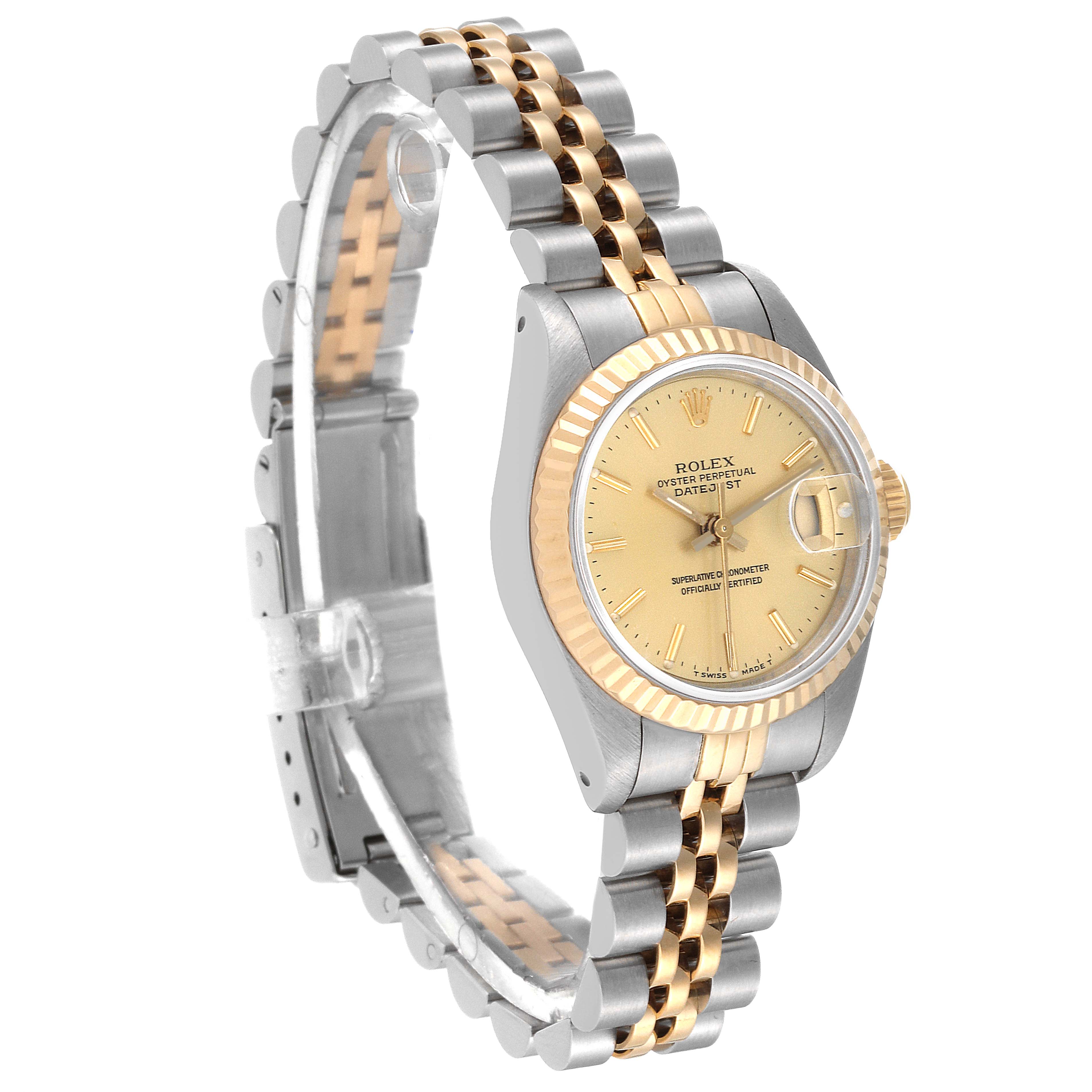 The Rolex Datejust 69173 Women's Steel and Gold (two tone) Champagne Dial 69173 Women's Steel and Gold (two tone) Champagne Dial watch is shown at a side angle, displaying its two-tone bracelet, fluted bezel, and champagne dial.