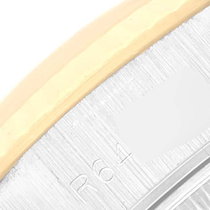 This close-up image shows the bezel and part of the dial edge of a Rolex Datejust 69173 Women's Steel and Gold (two tone) Champagne Dial 69173 Women's Steel and Gold (two tone) Champagne Dial watch.