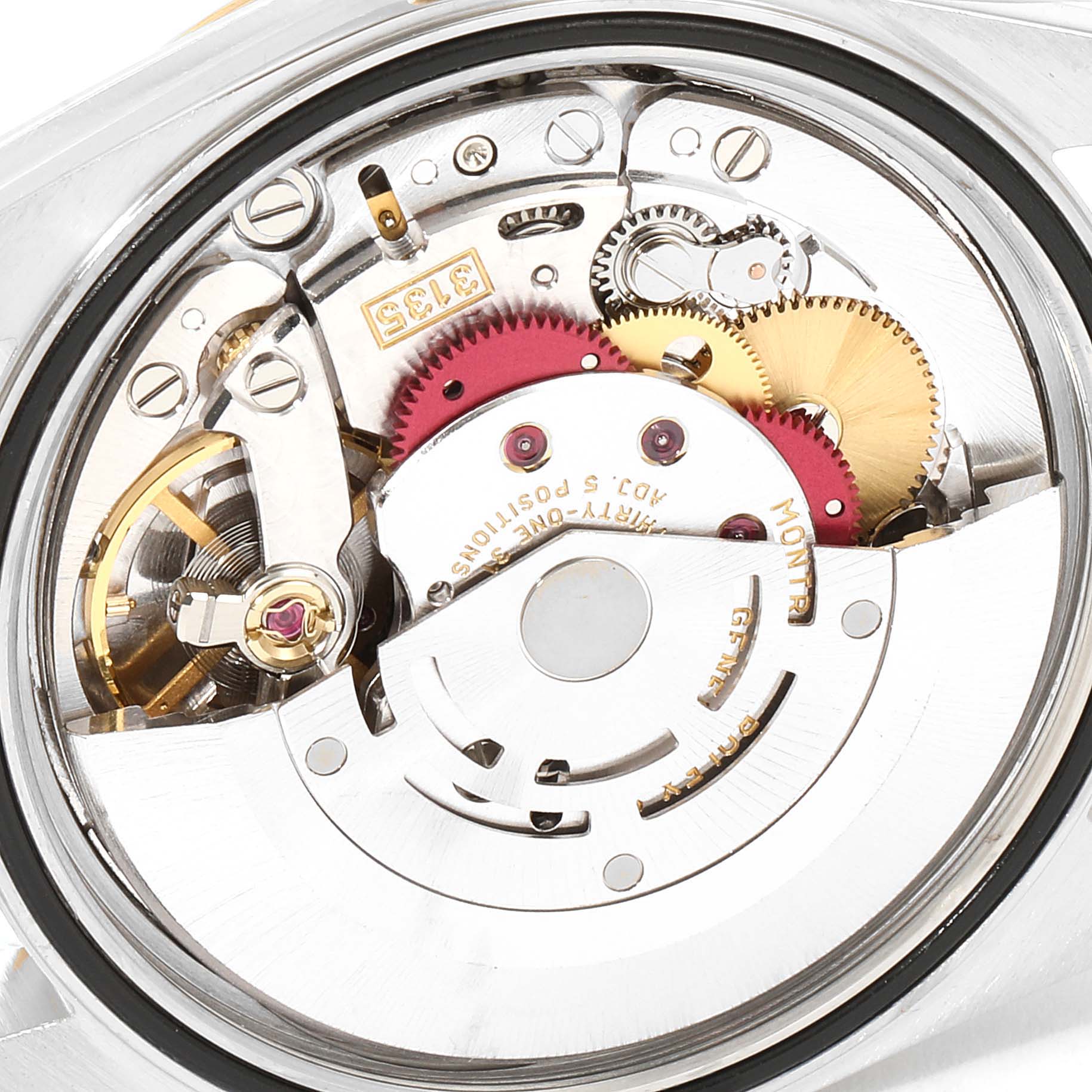 The image shows a close-up view of the movement mechanism inside a Rolex Datejust 16233 Men's Steel and Gold (two tone) Silver Dial 16233 Men's Steel and Gold (two tone) Silver Dial watch.