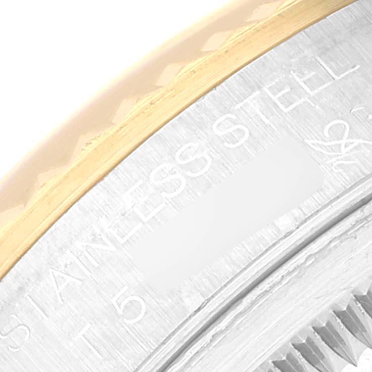 The image shows a close-up of the stainless steel and gold bezel of a Rolex Datejust 16233 Men's Steel and Gold (two tone) White Dial 16233 Men's Steel and Gold (two tone) White Dial watch.