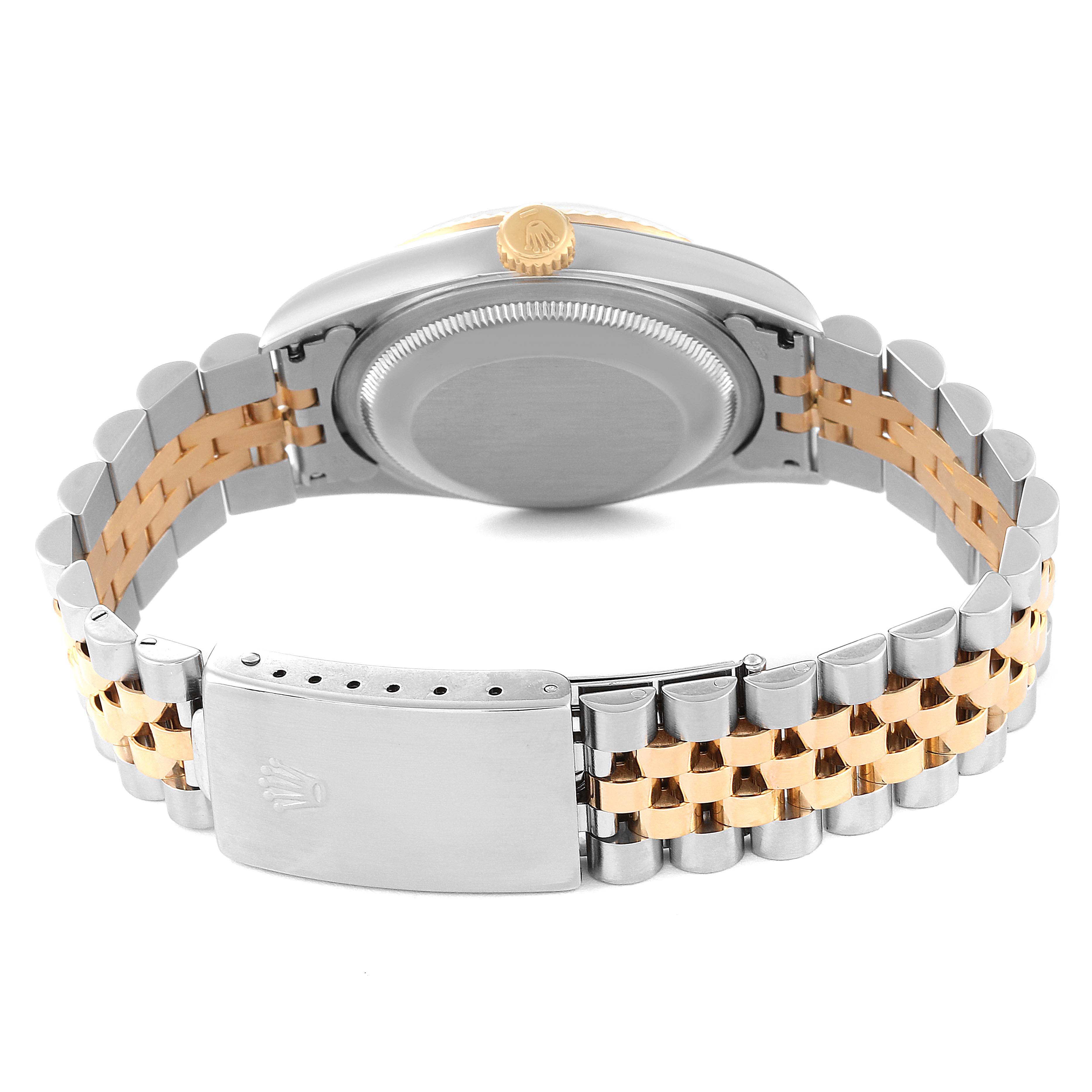 The image shows the back case and clasp of a Rolex Datejust 16233 Men's Steel and Gold (two tone) White Dial 16233 Men's Steel and Gold (two tone) White Dial watch, highlighting its two-tone bracelet.
