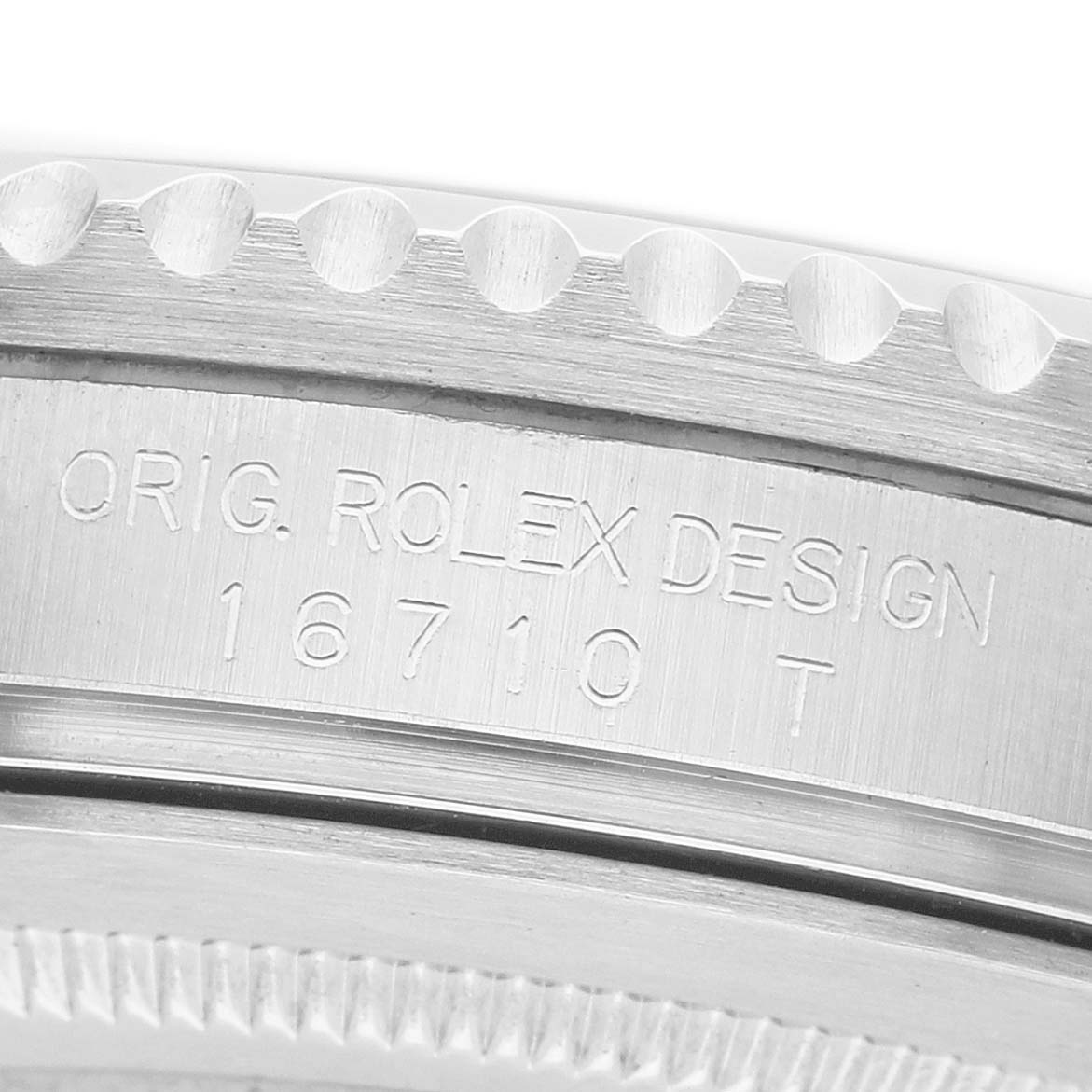 The image shows a close-up of the side of a Rolex GMT-Master 16710 Men's Stainless Steel Black Dial watch case, highlighting the model number 16710.