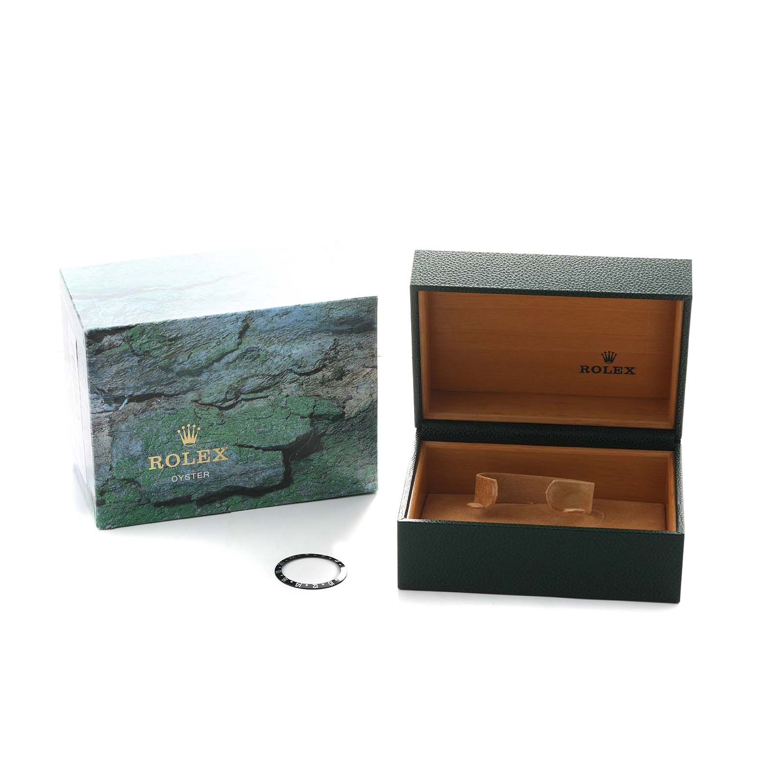 The image shows a Rolex GMT-Master 16710 Men's Stainless Steel Black Dial box, an outer sleeve, and a bezel insert, all viewed from above and slightly angled.