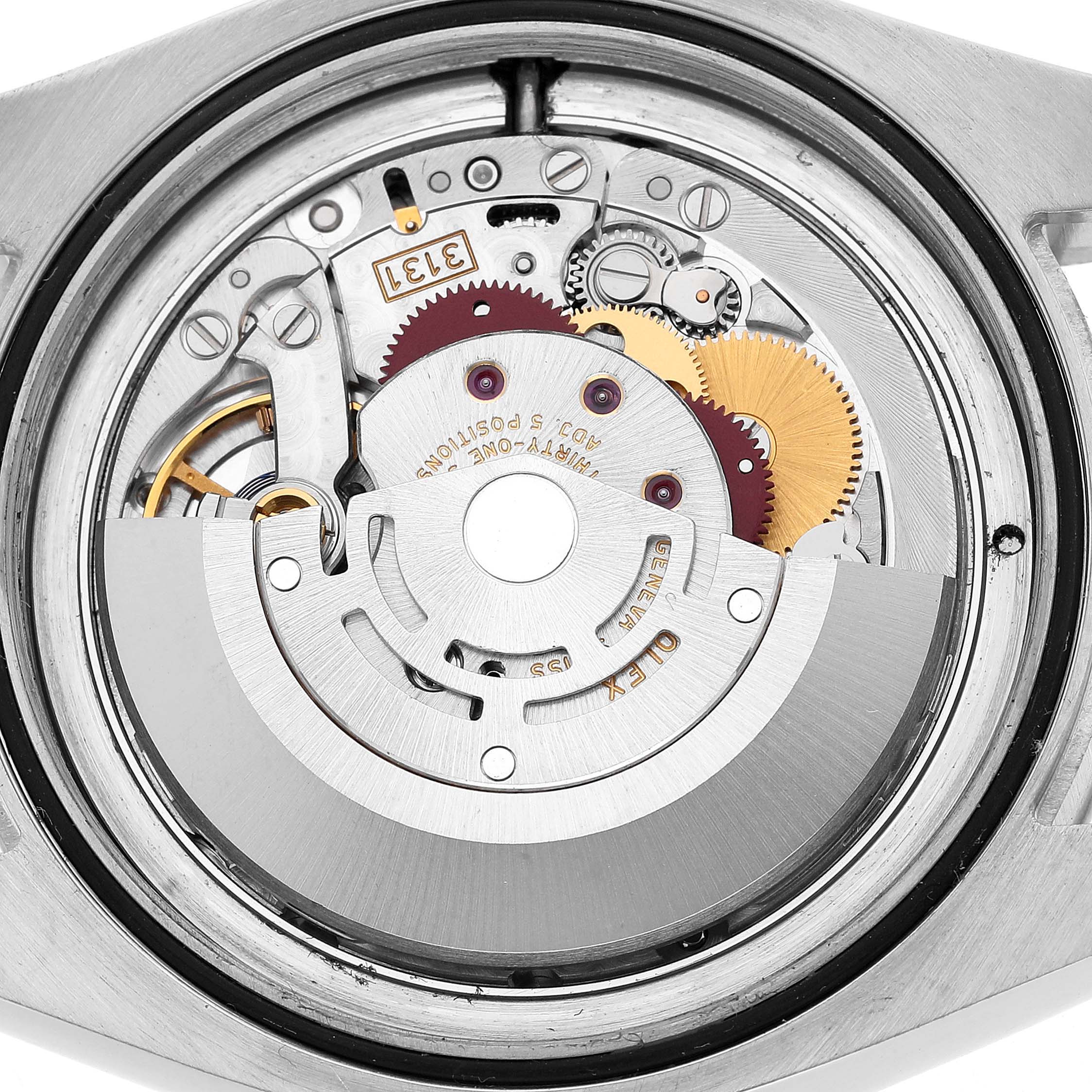 The image shows the movement of the Rolex Milgauss 116400 Men's Stainless Steel Black Dial watch from a top-down angle.