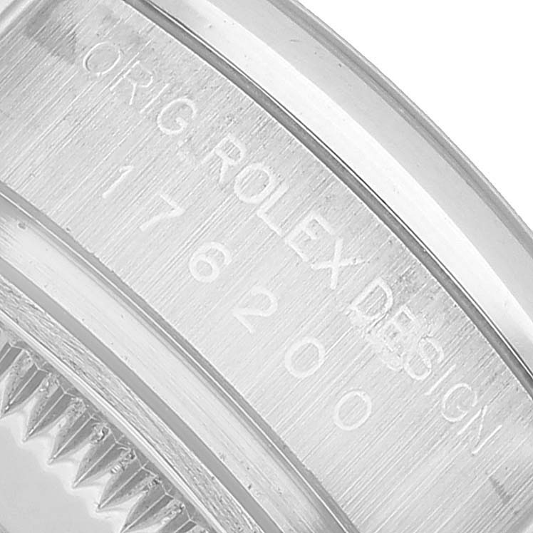 The image shows a close-up of the serial and model number engraving on the side of a Rolex Oyster Perpetual 176200 Women's Stainless Steel Silver Dial watch case.