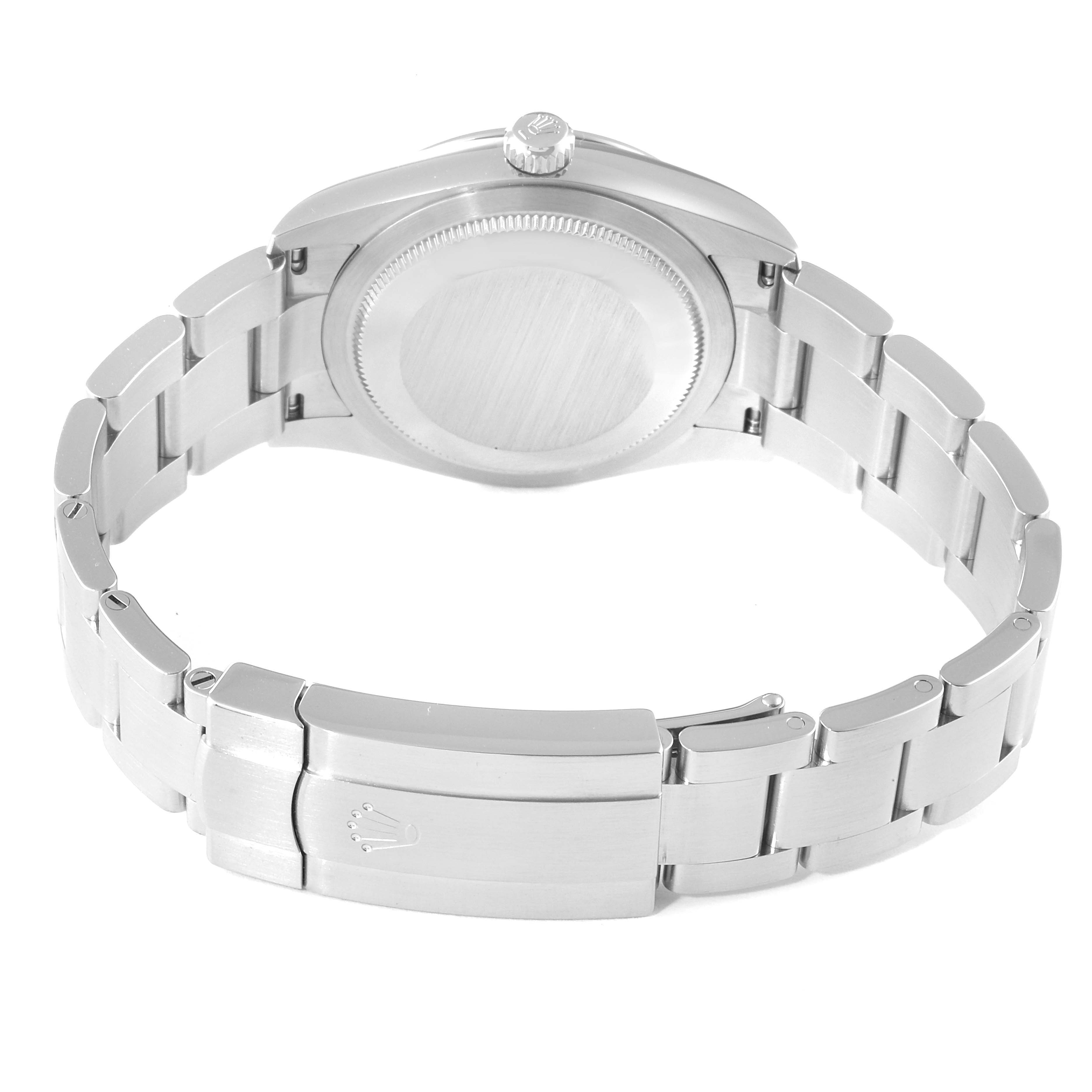 The image shows a Rolex Oyster Perpetual 124200 Men's Stainless Steel Black Dial 124200 Men's Stainless Steel Black Dial watch from the rear, highlighting its clasp, bracelet, and case back.